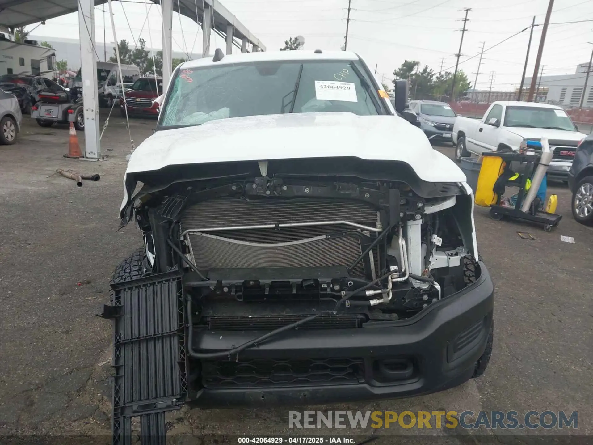 12 Photograph of a damaged car 3C6UR5CL1NG438188 RAM 2500 2022
