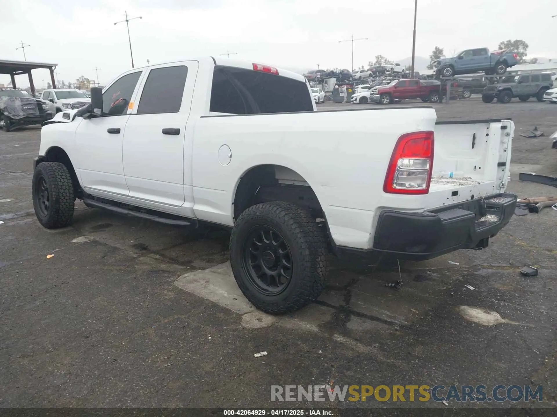 3 Photograph of a damaged car 3C6UR5CL1NG438188 RAM 2500 2022