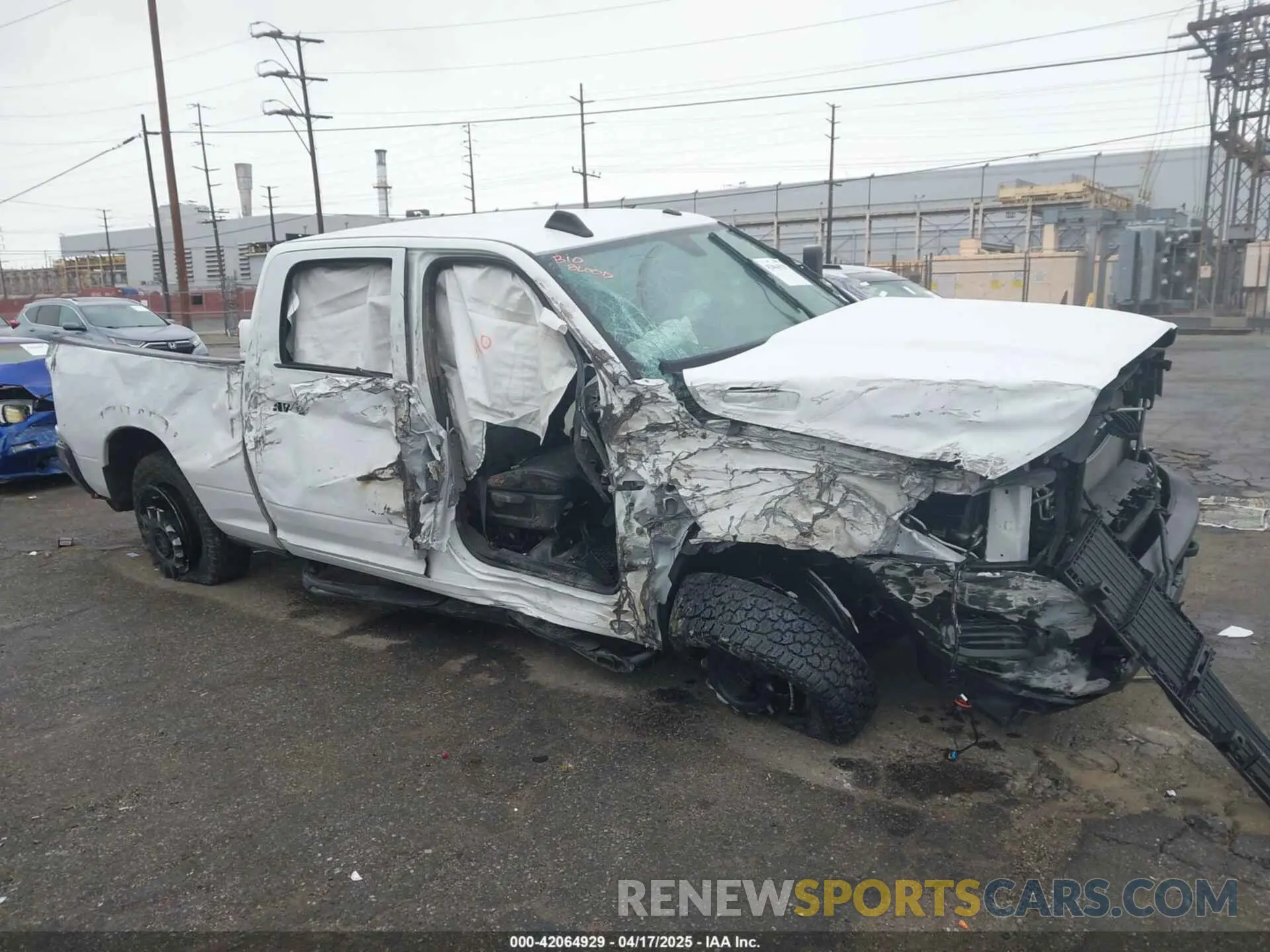 6 Photograph of a damaged car 3C6UR5CL1NG438188 RAM 2500 2022