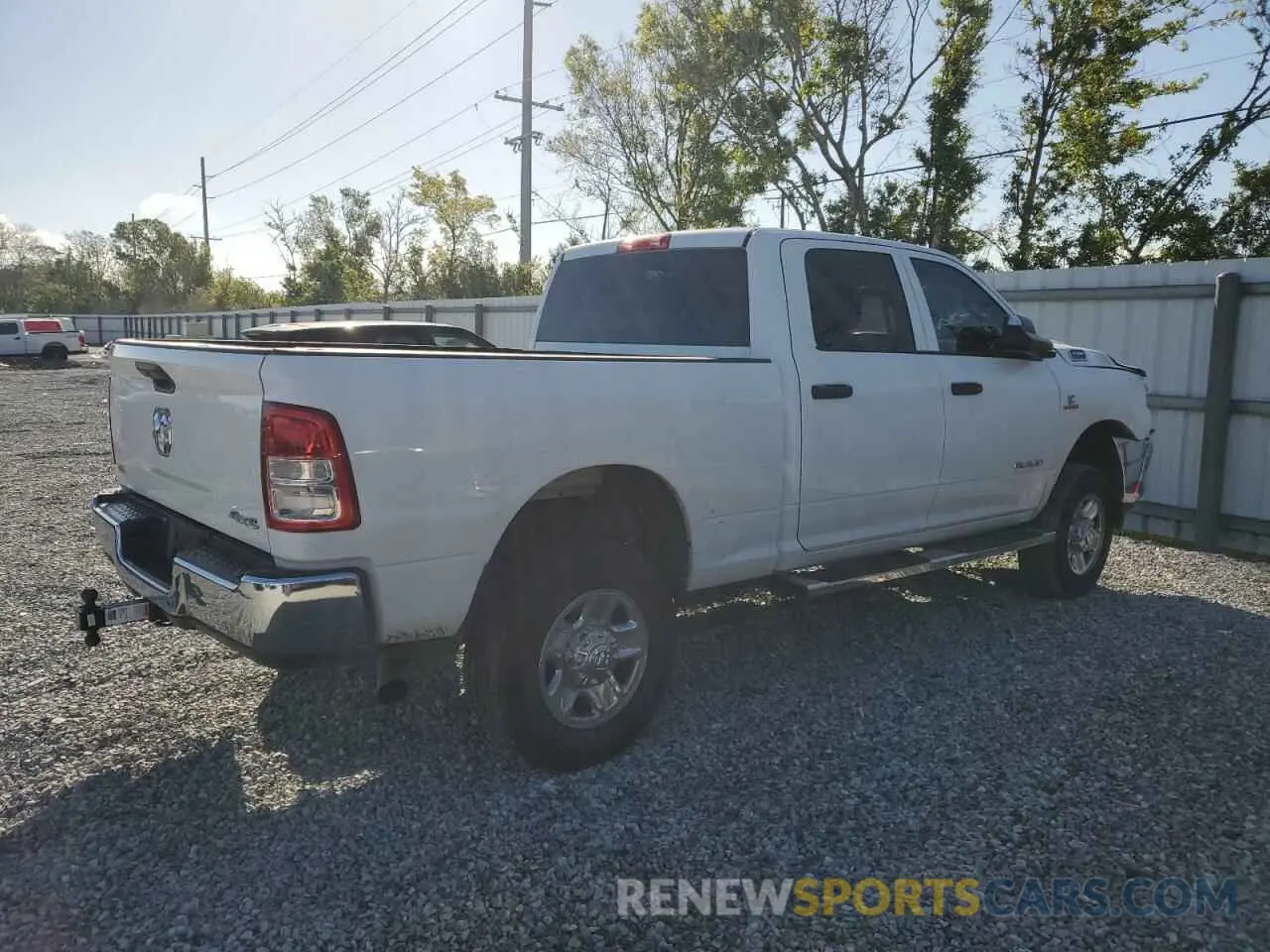 3 Photograph of a damaged car 3C6UR5CL3NG176111 RAM 2500 2022