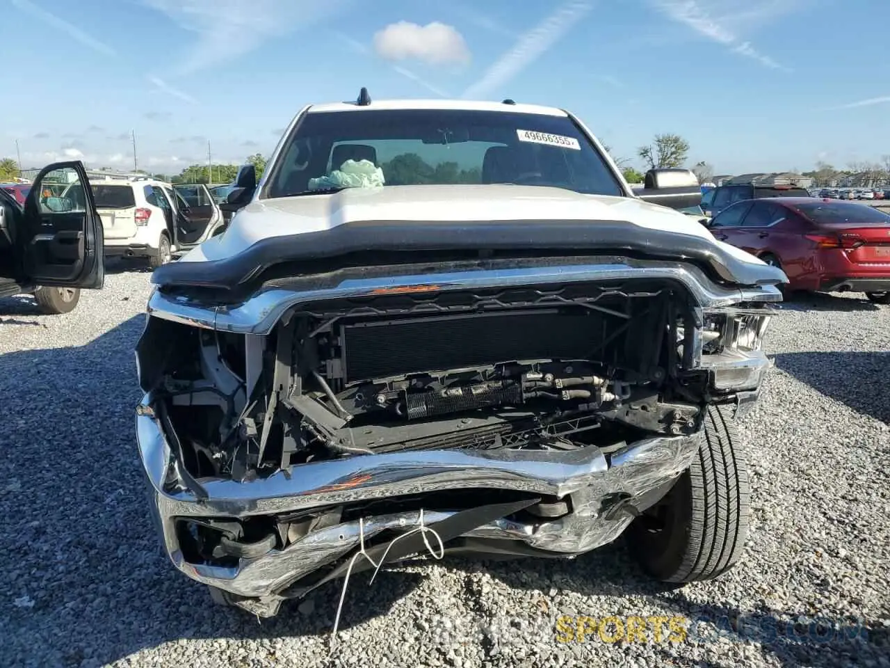 5 Photograph of a damaged car 3C6UR5CL3NG176111 RAM 2500 2022