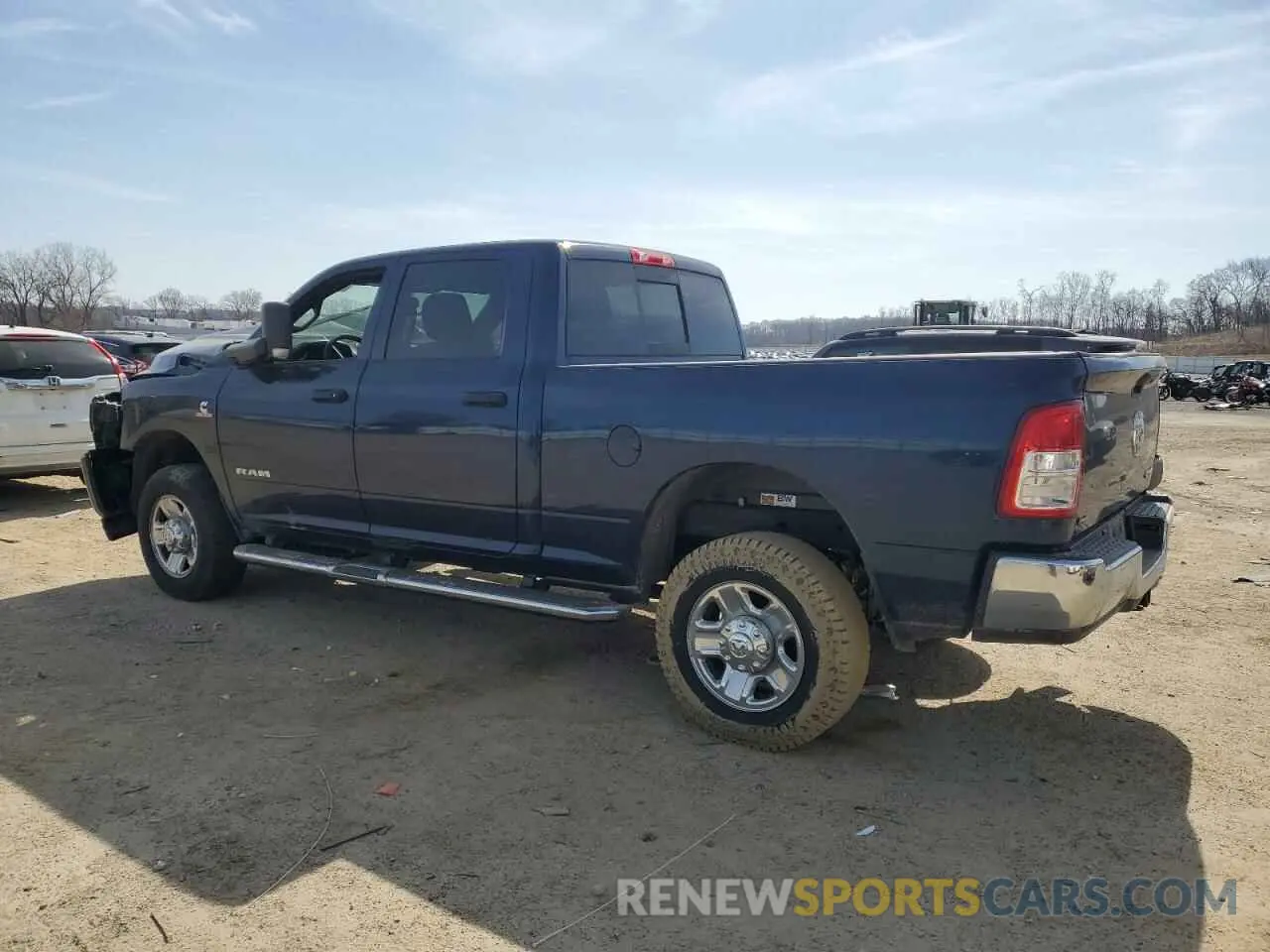 2 Photograph of a damaged car 3C6UR5CL3NG439407 RAM 2500 2022