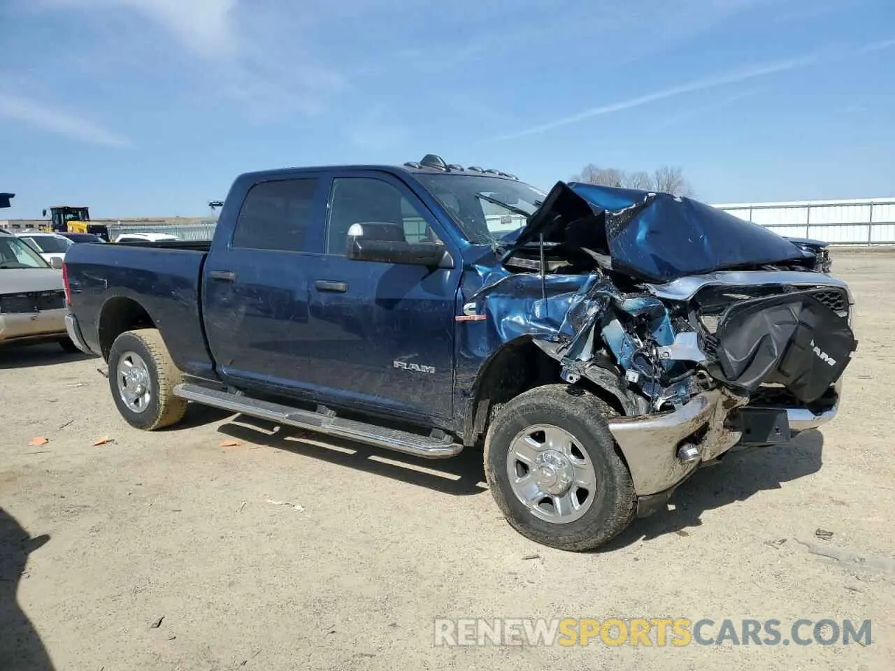 4 Photograph of a damaged car 3C6UR5CL3NG439407 RAM 2500 2022