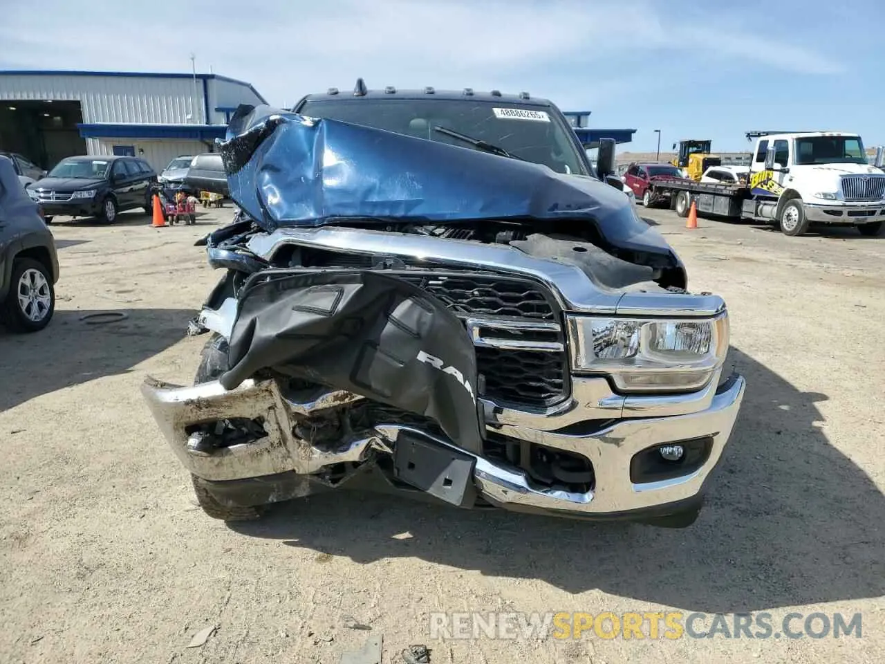 5 Photograph of a damaged car 3C6UR5CL3NG439407 RAM 2500 2022