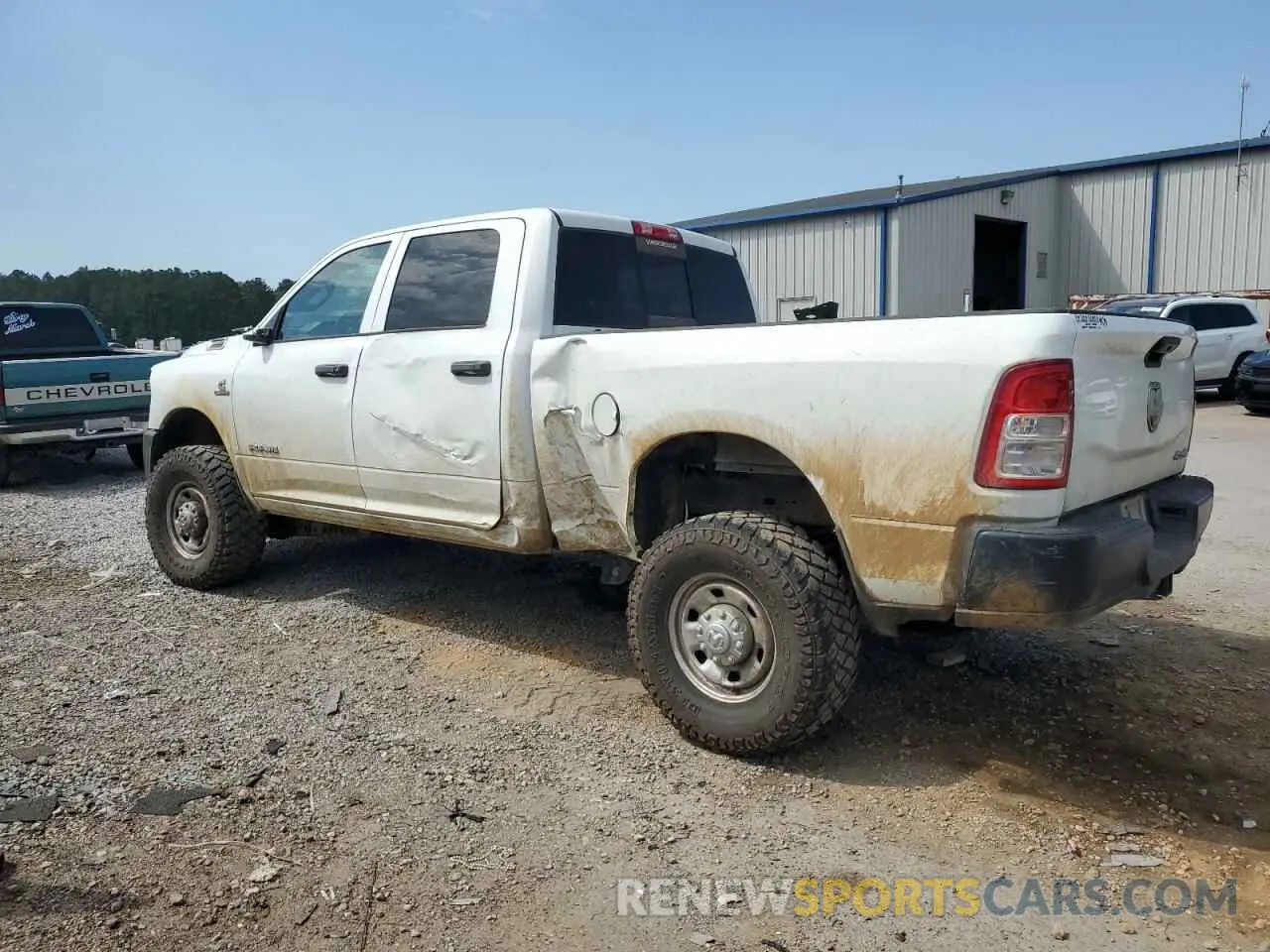 2 Photograph of a damaged car 3C6UR5CL5NG139495 RAM 2500 2022