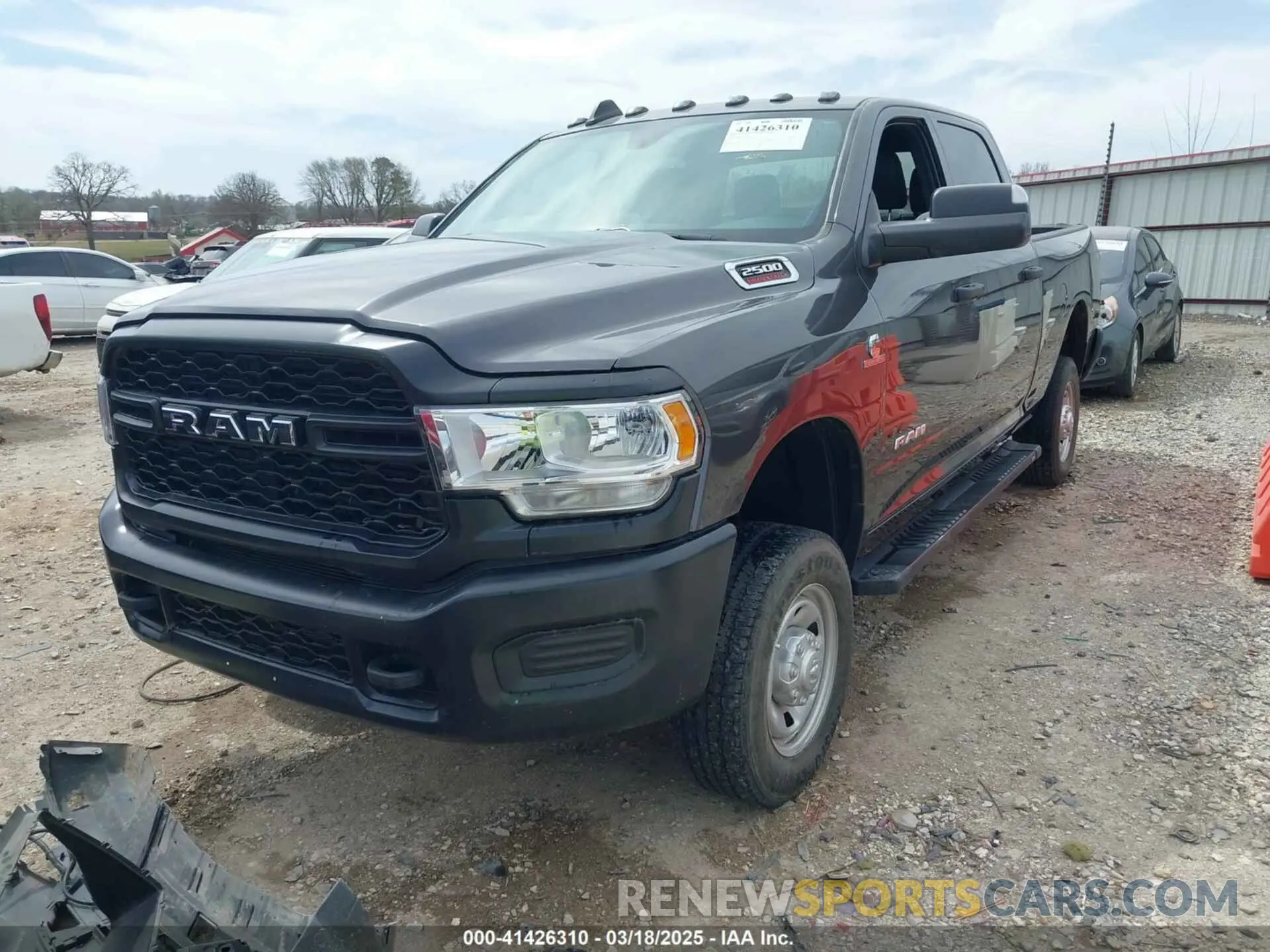 2 Photograph of a damaged car 3C6UR5CL6NG144527 RAM 2500 2022