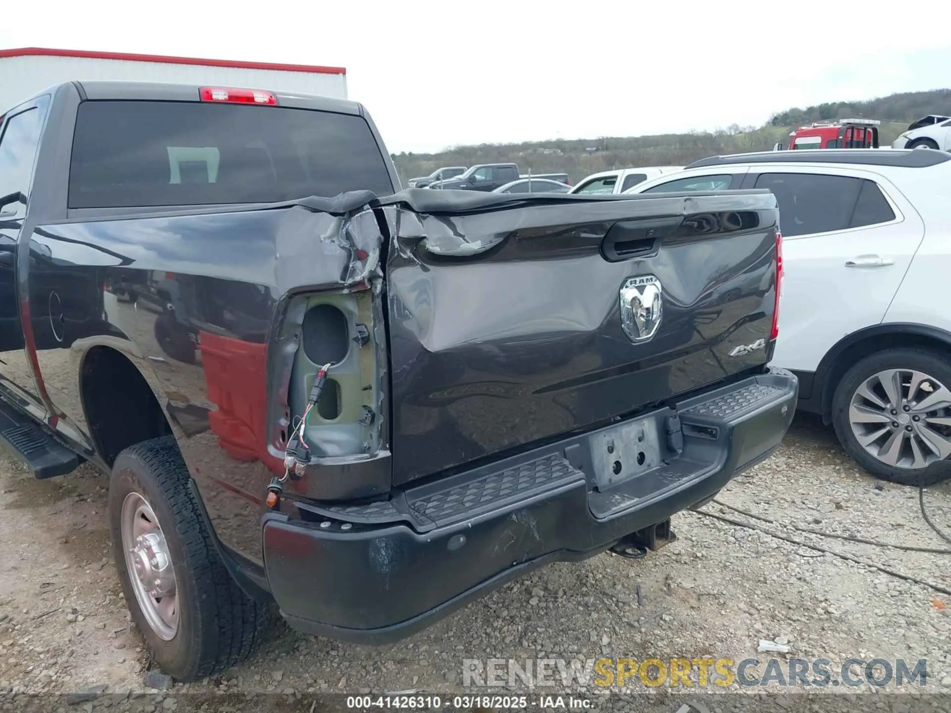 6 Photograph of a damaged car 3C6UR5CL6NG144527 RAM 2500 2022