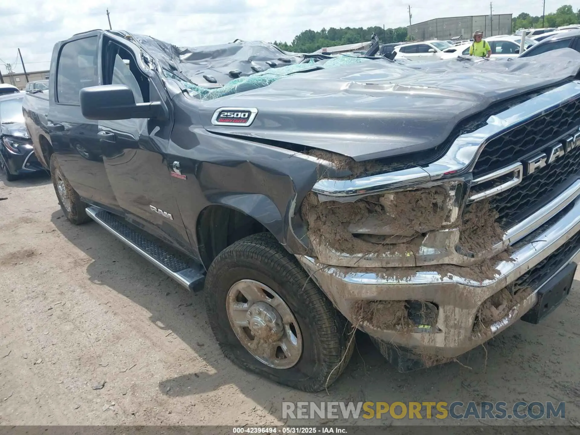 1 Photograph of a damaged car 3C6UR5CL7NG224127 RAM 2500 2022