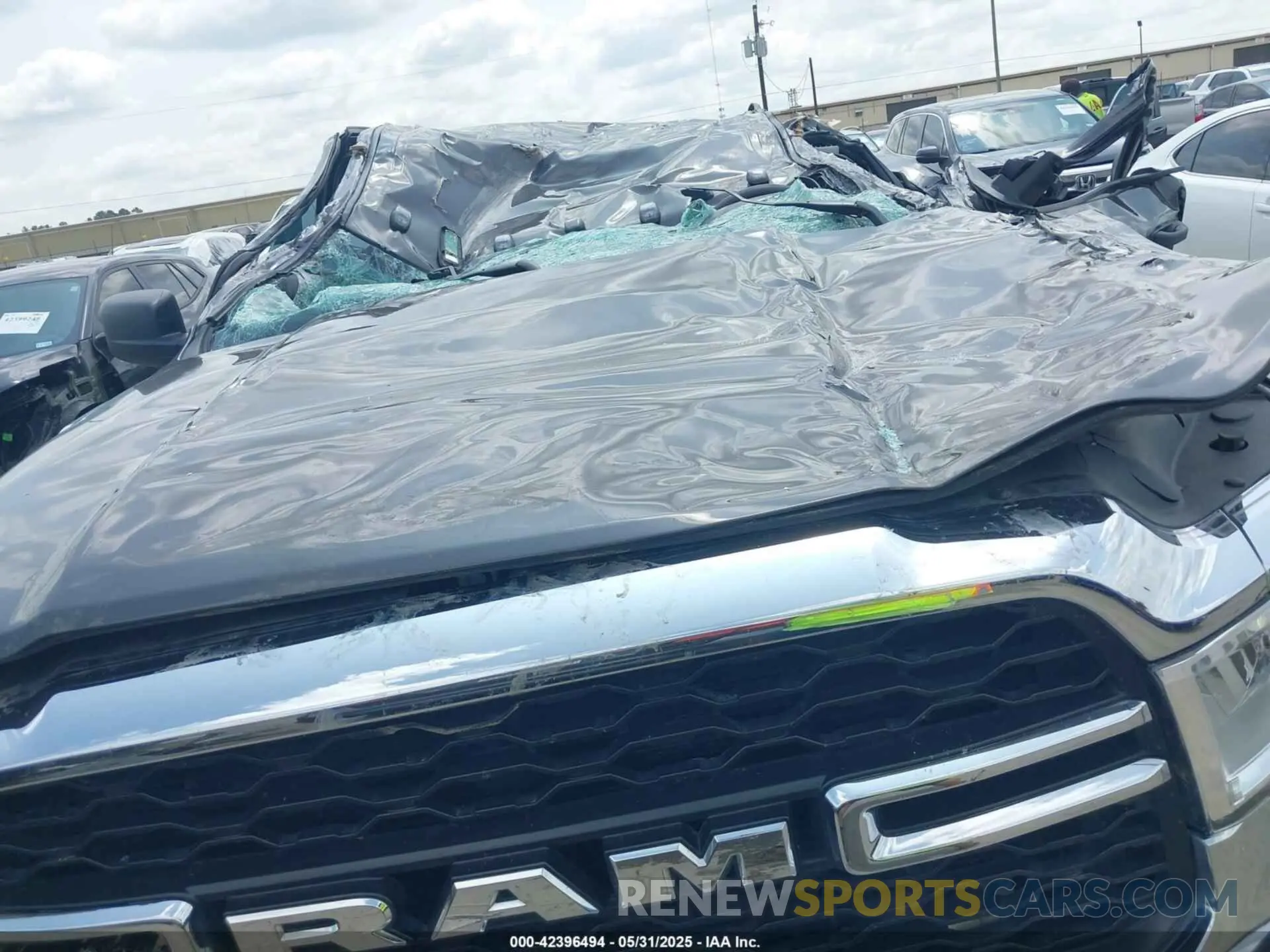 10 Photograph of a damaged car 3C6UR5CL7NG224127 RAM 2500 2022