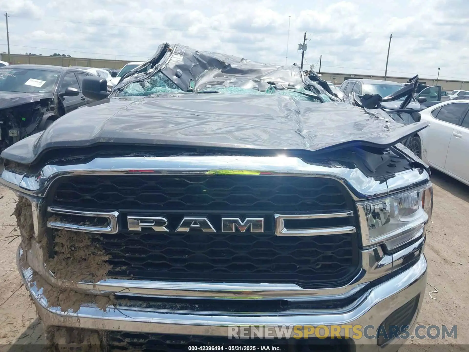 11 Photograph of a damaged car 3C6UR5CL7NG224127 RAM 2500 2022