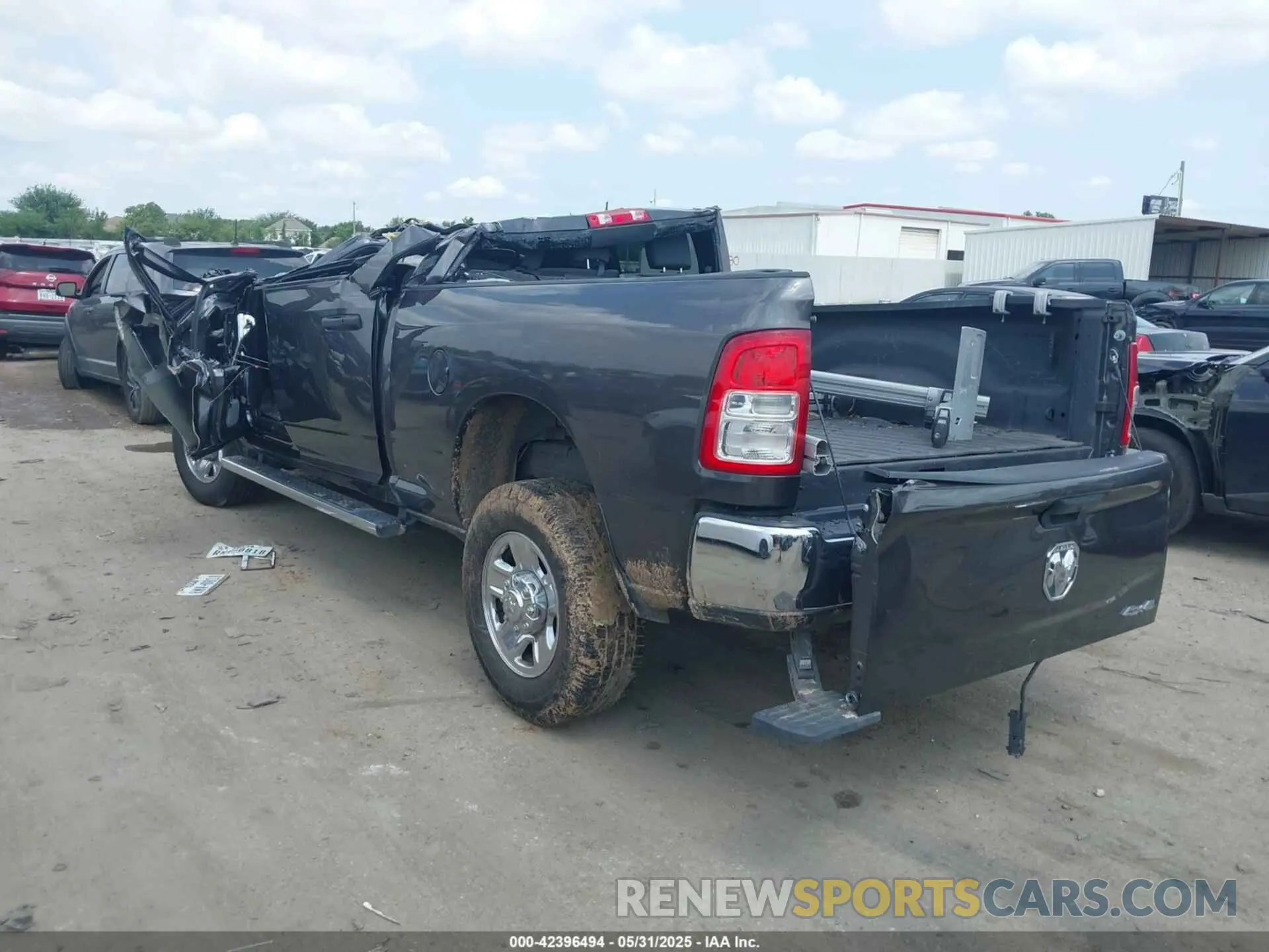 3 Photograph of a damaged car 3C6UR5CL7NG224127 RAM 2500 2022