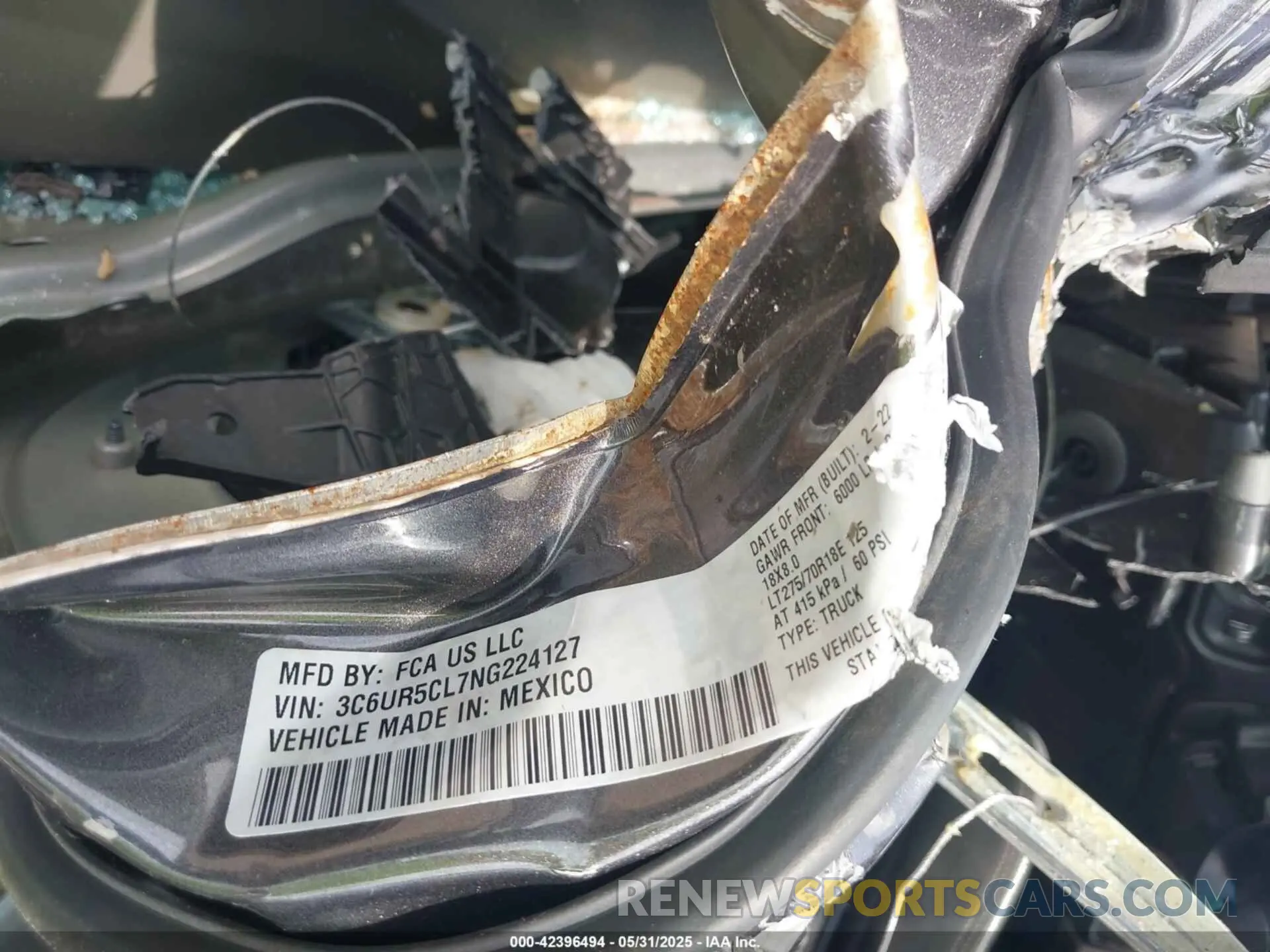 9 Photograph of a damaged car 3C6UR5CL7NG224127 RAM 2500 2022