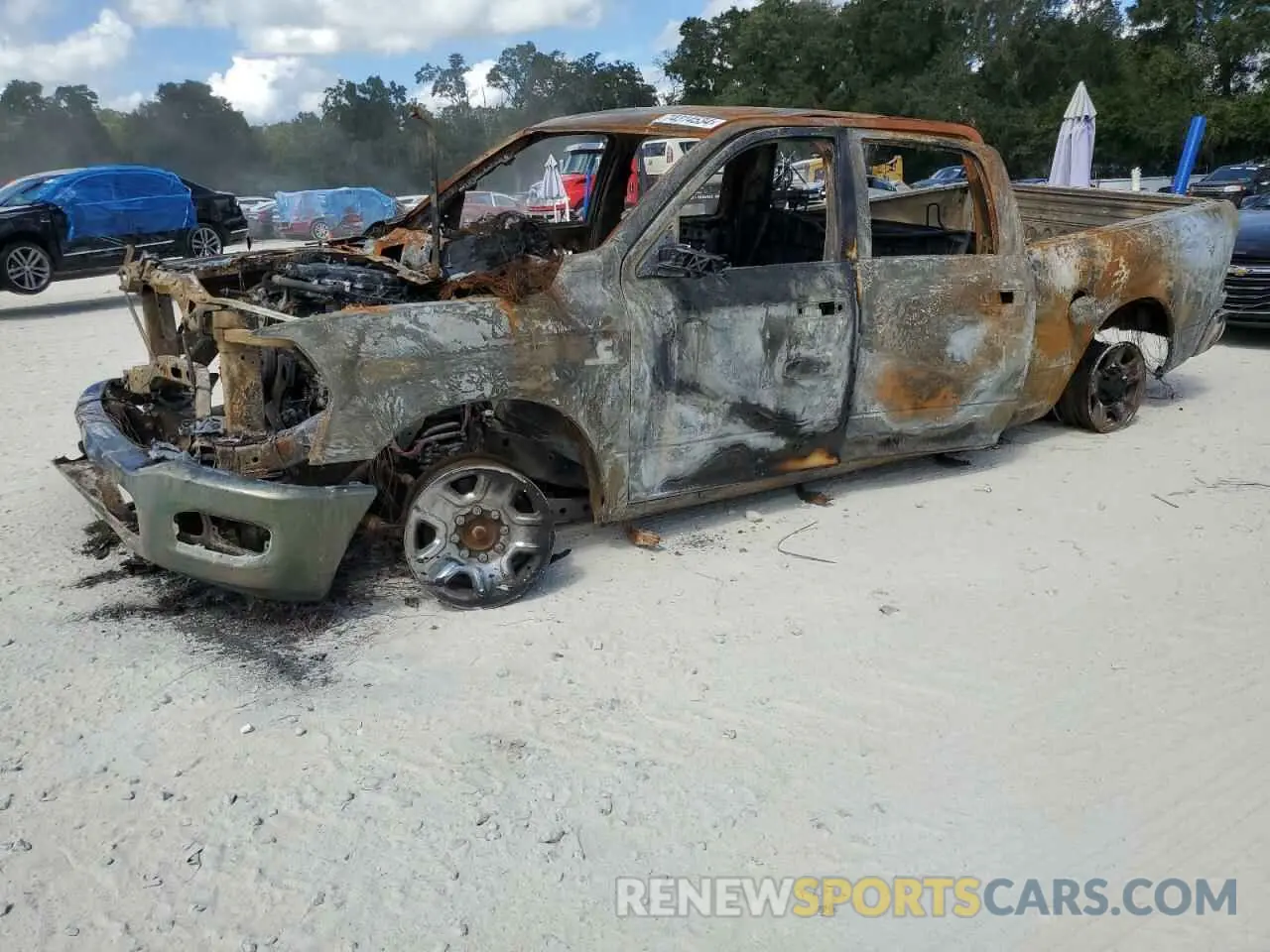 1 Photograph of a damaged car 3C6UR5CL7NG401288 RAM 2500 2022