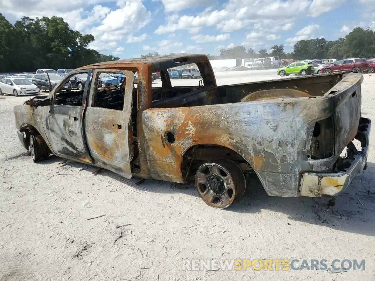 2 Photograph of a damaged car 3C6UR5CL7NG401288 RAM 2500 2022