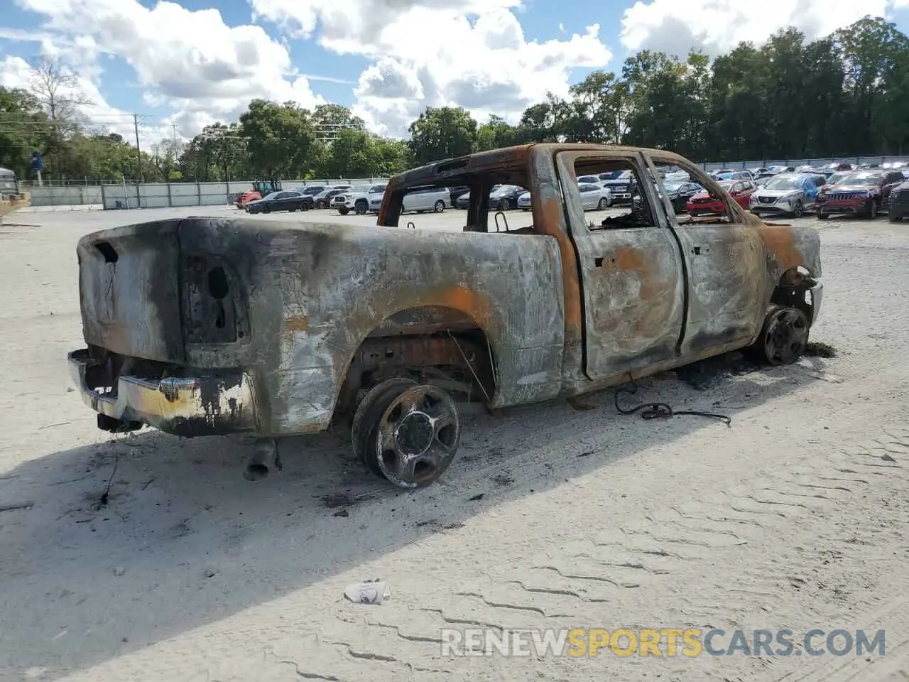 3 Photograph of a damaged car 3C6UR5CL7NG401288 RAM 2500 2022