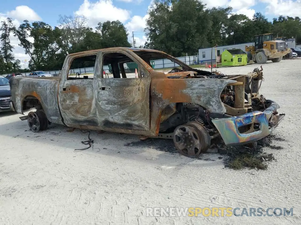 4 Photograph of a damaged car 3C6UR5CL7NG401288 RAM 2500 2022