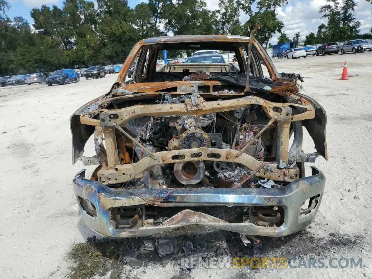 5 Photograph of a damaged car 3C6UR5CL7NG401288 RAM 2500 2022