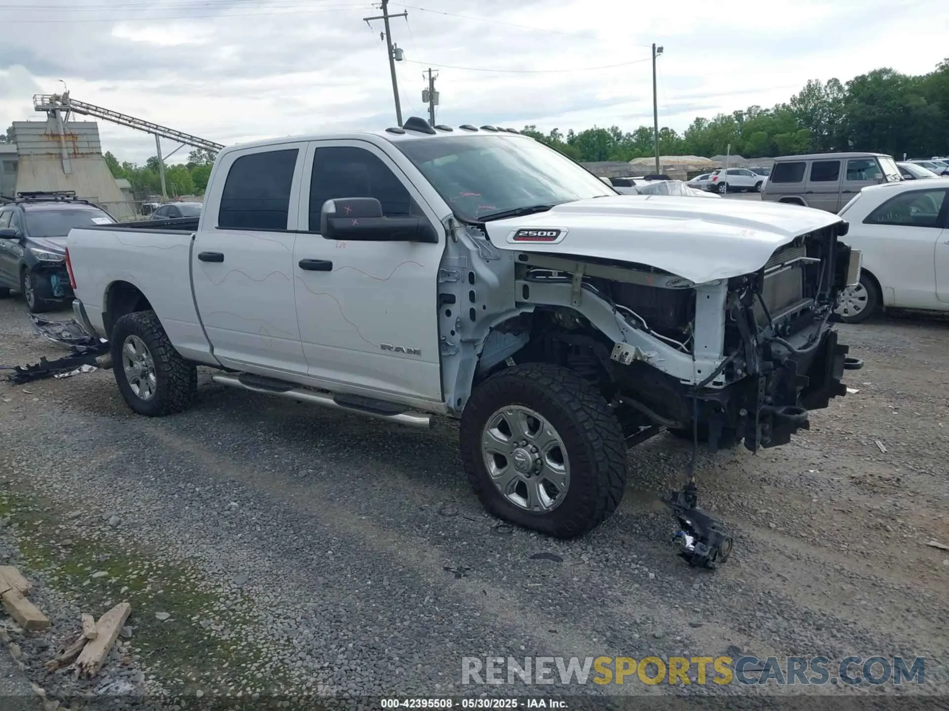 1 Photograph of a damaged car 3C6UR5CL9NG126846 RAM 2500 2022