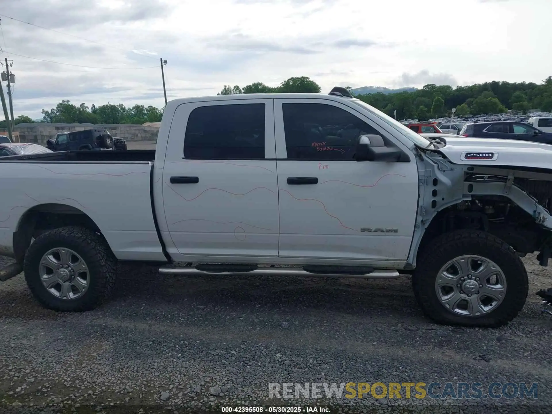 14 Photograph of a damaged car 3C6UR5CL9NG126846 RAM 2500 2022