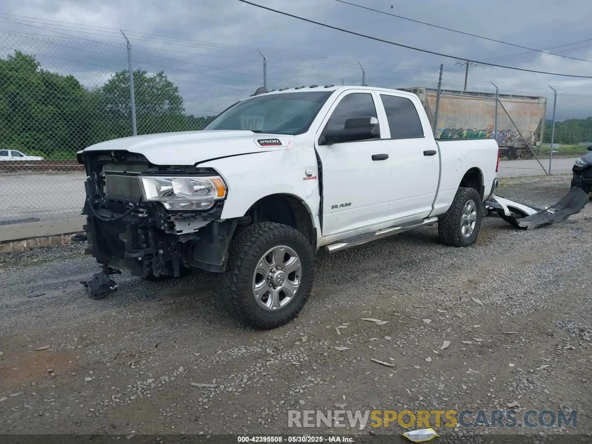 2 Photograph of a damaged car 3C6UR5CL9NG126846 RAM 2500 2022