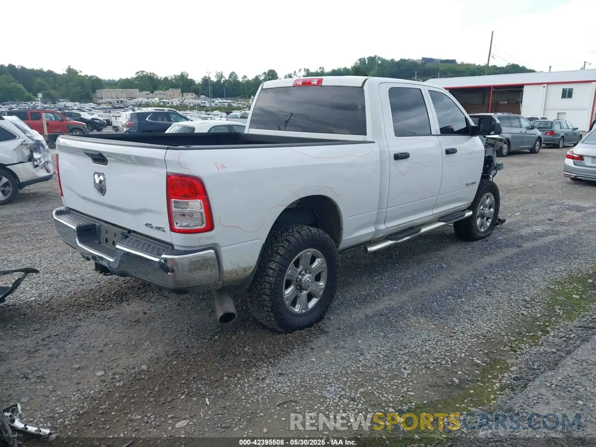 4 Photograph of a damaged car 3C6UR5CL9NG126846 RAM 2500 2022