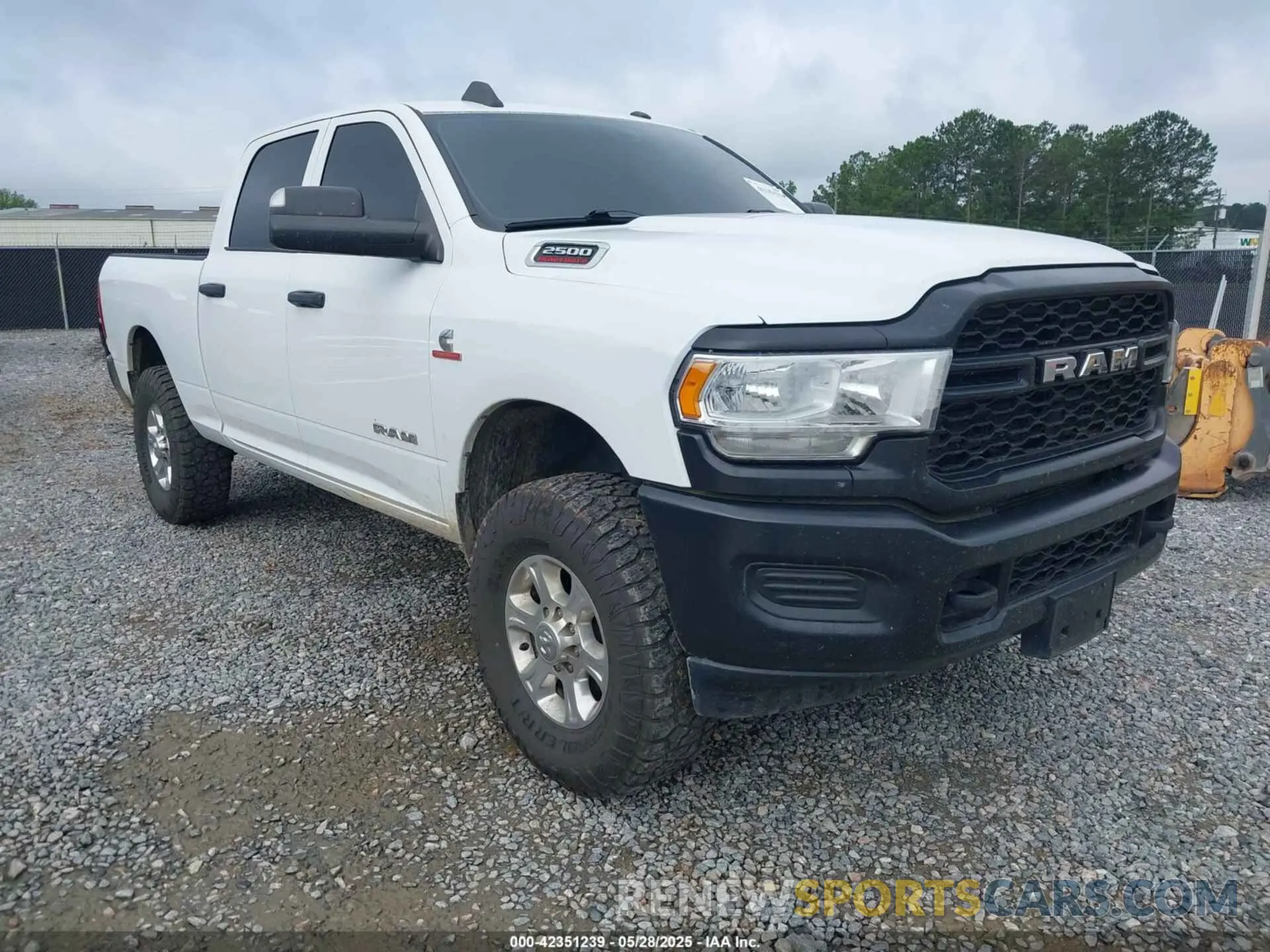 1 Photograph of a damaged car 3C6UR5CL9NG159894 RAM 2500 2022