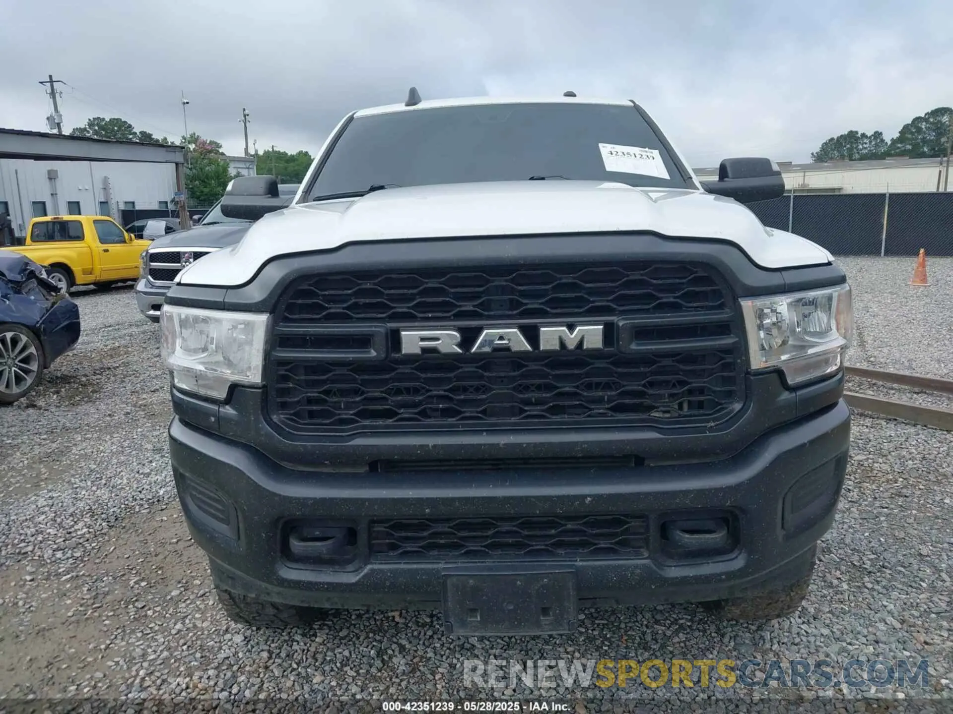 12 Photograph of a damaged car 3C6UR5CL9NG159894 RAM 2500 2022