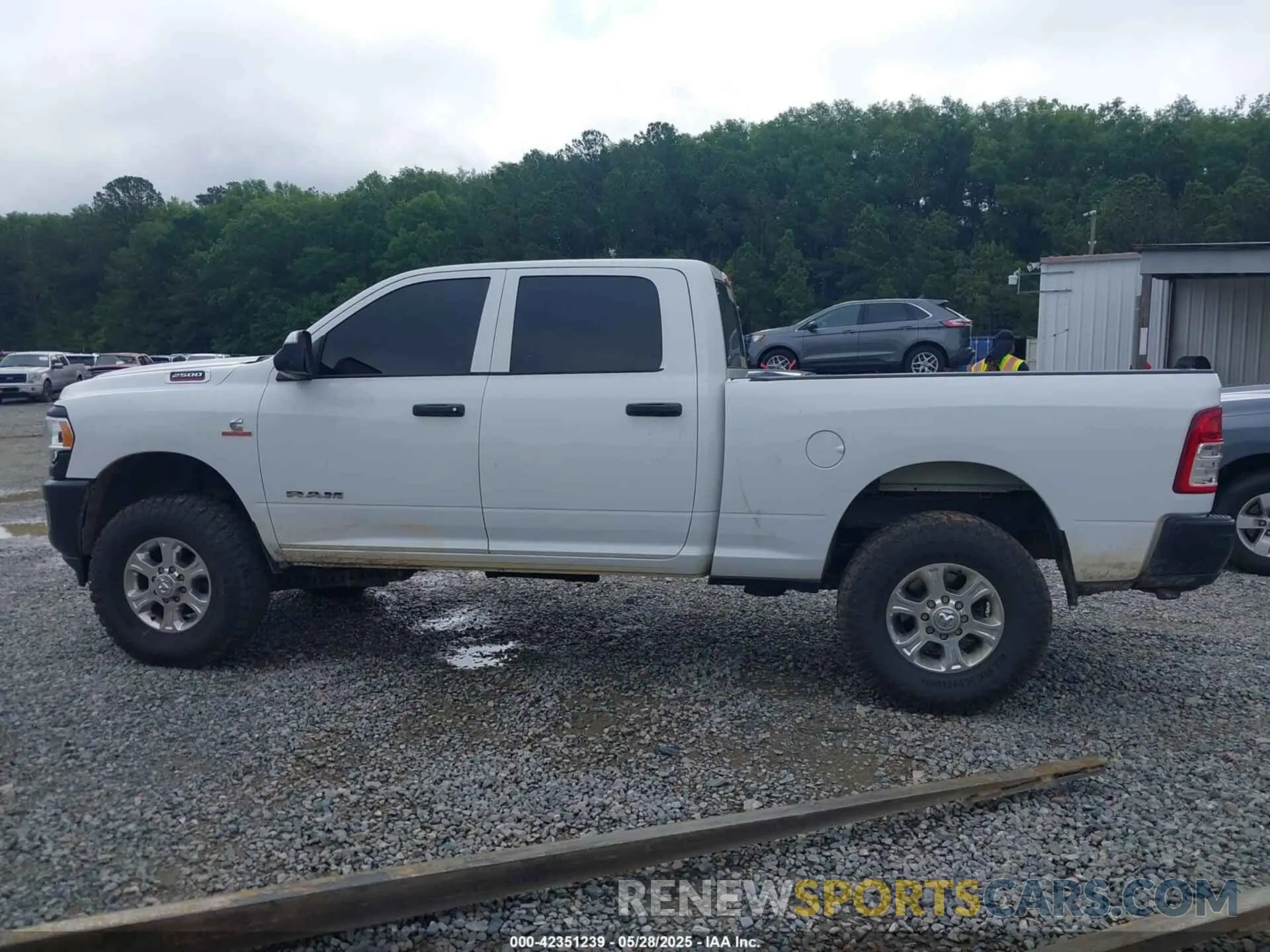 14 Photograph of a damaged car 3C6UR5CL9NG159894 RAM 2500 2022