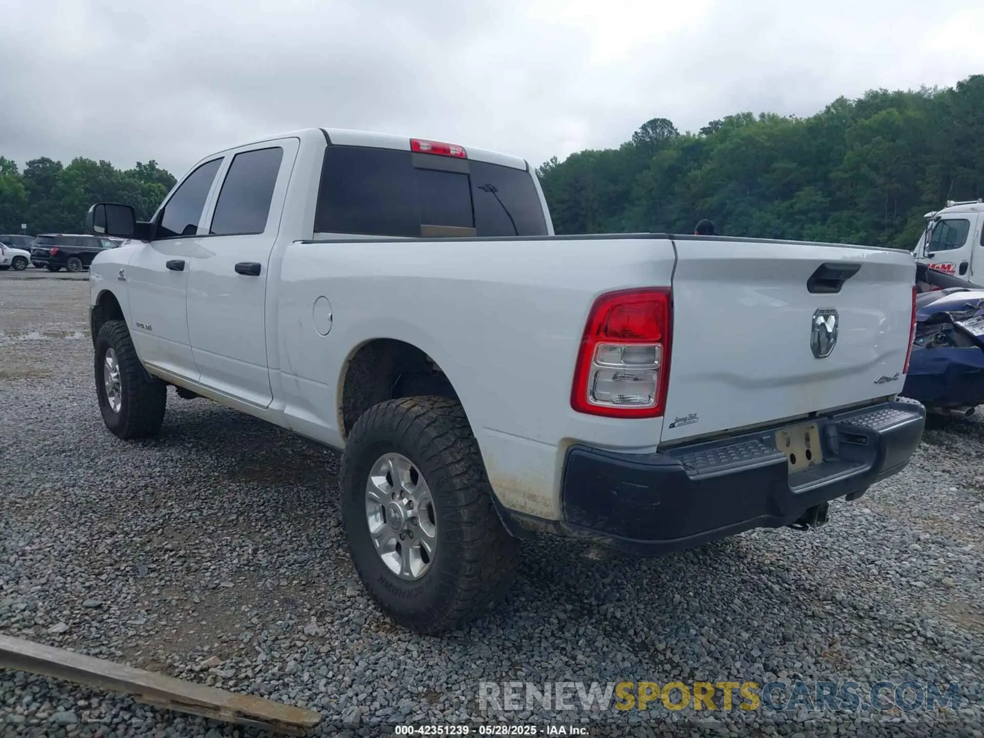 3 Photograph of a damaged car 3C6UR5CL9NG159894 RAM 2500 2022