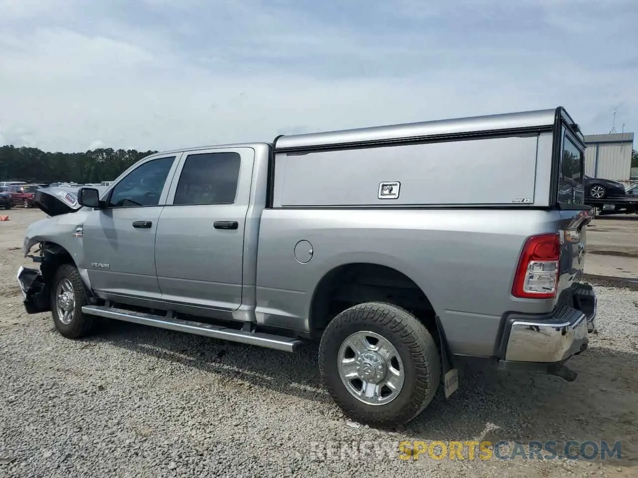 2 Photograph of a damaged car 3C6UR5CLXNG221402 RAM 2500 2022