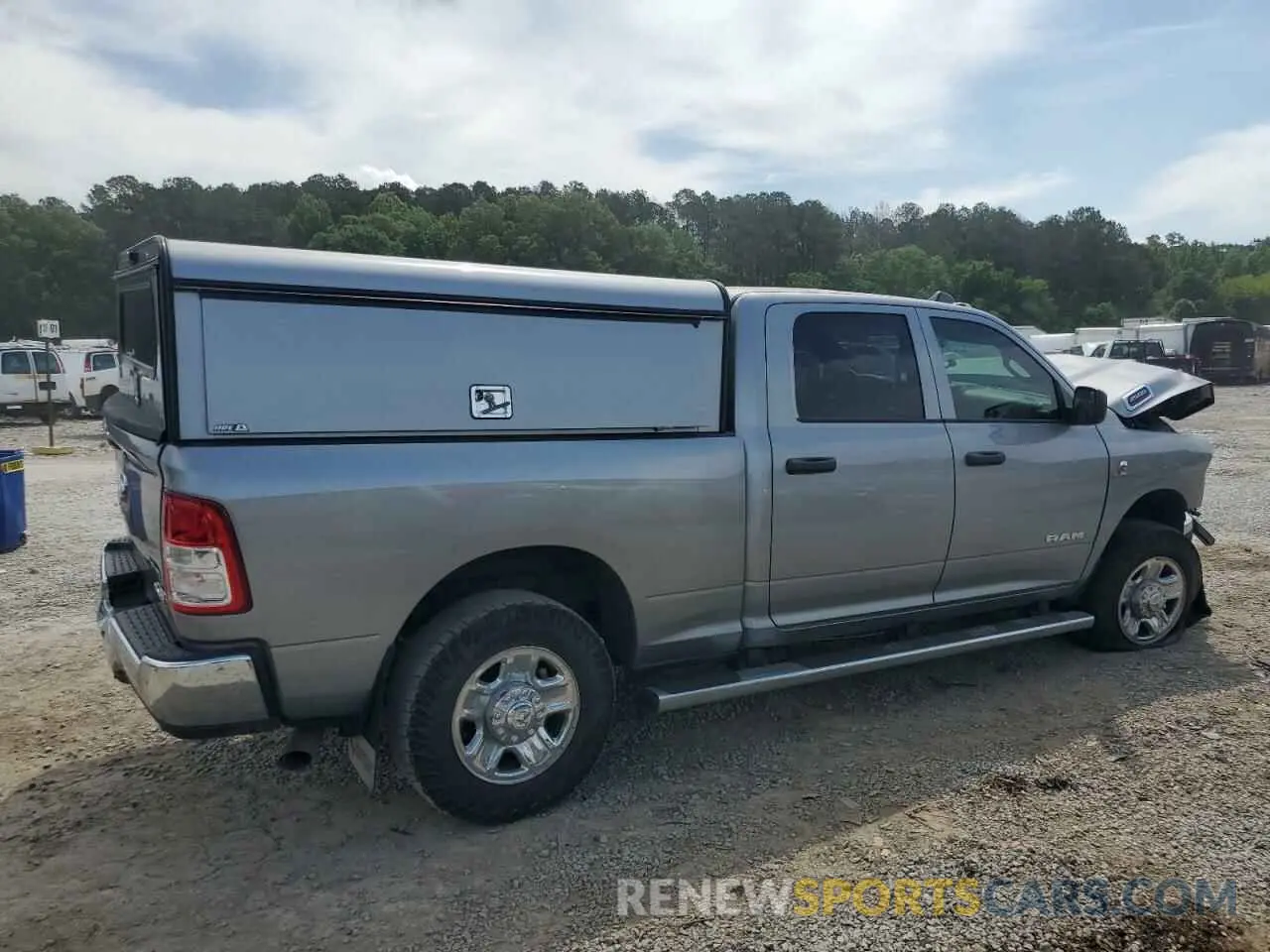 3 Photograph of a damaged car 3C6UR5CLXNG221402 RAM 2500 2022