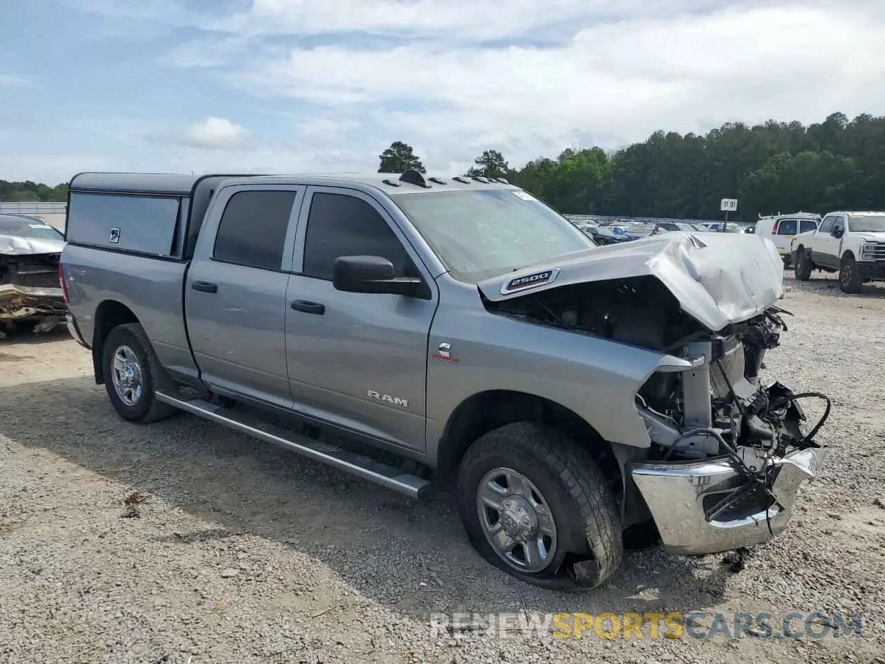 4 Photograph of a damaged car 3C6UR5CLXNG221402 RAM 2500 2022