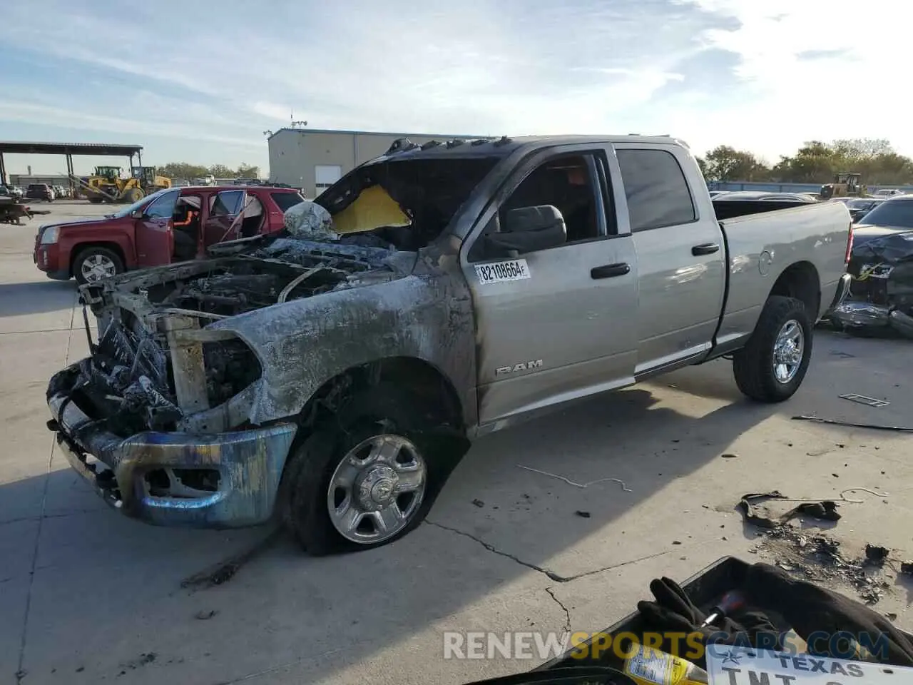 1 Photograph of a damaged car 3C6UR5CLXNG325212 RAM 2500 2022