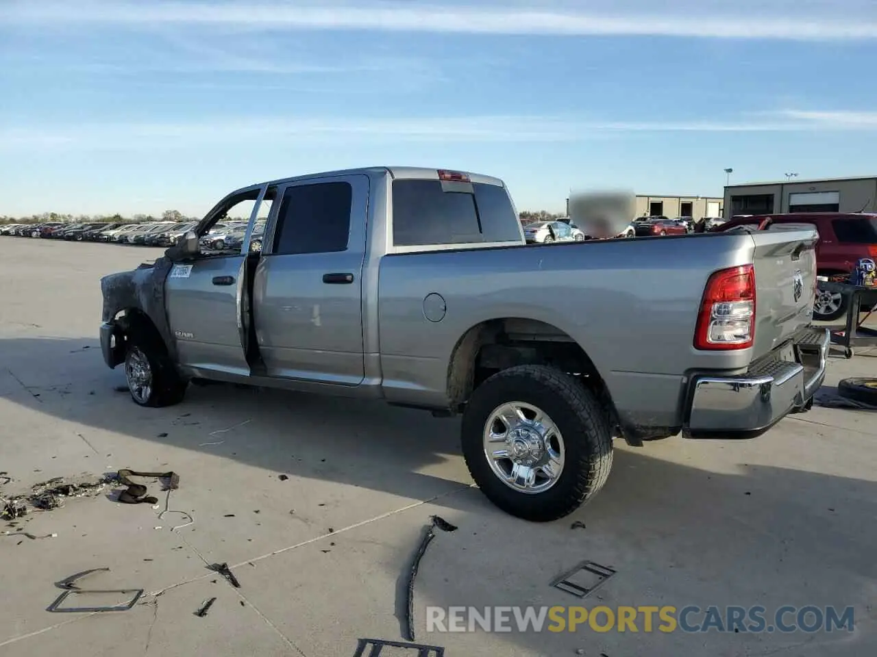 2 Photograph of a damaged car 3C6UR5CLXNG325212 RAM 2500 2022