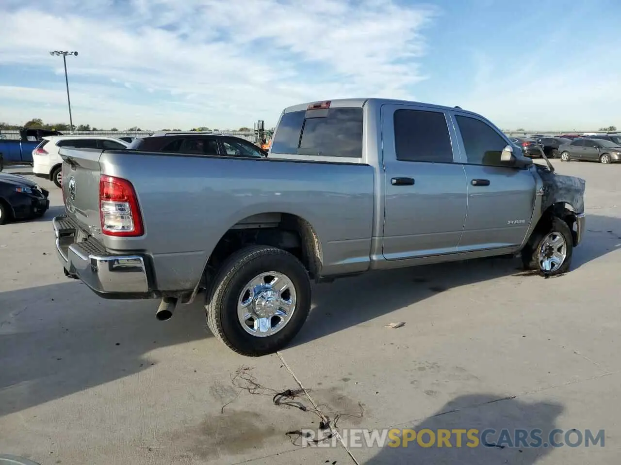 3 Photograph of a damaged car 3C6UR5CLXNG325212 RAM 2500 2022