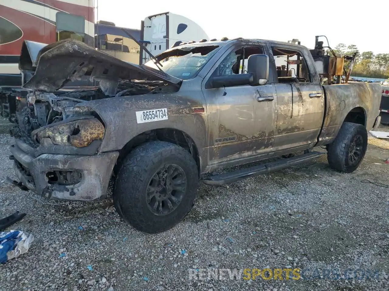 1 Photograph of a damaged car 3C6UR5DJ0NG397629 RAM 2500 2022