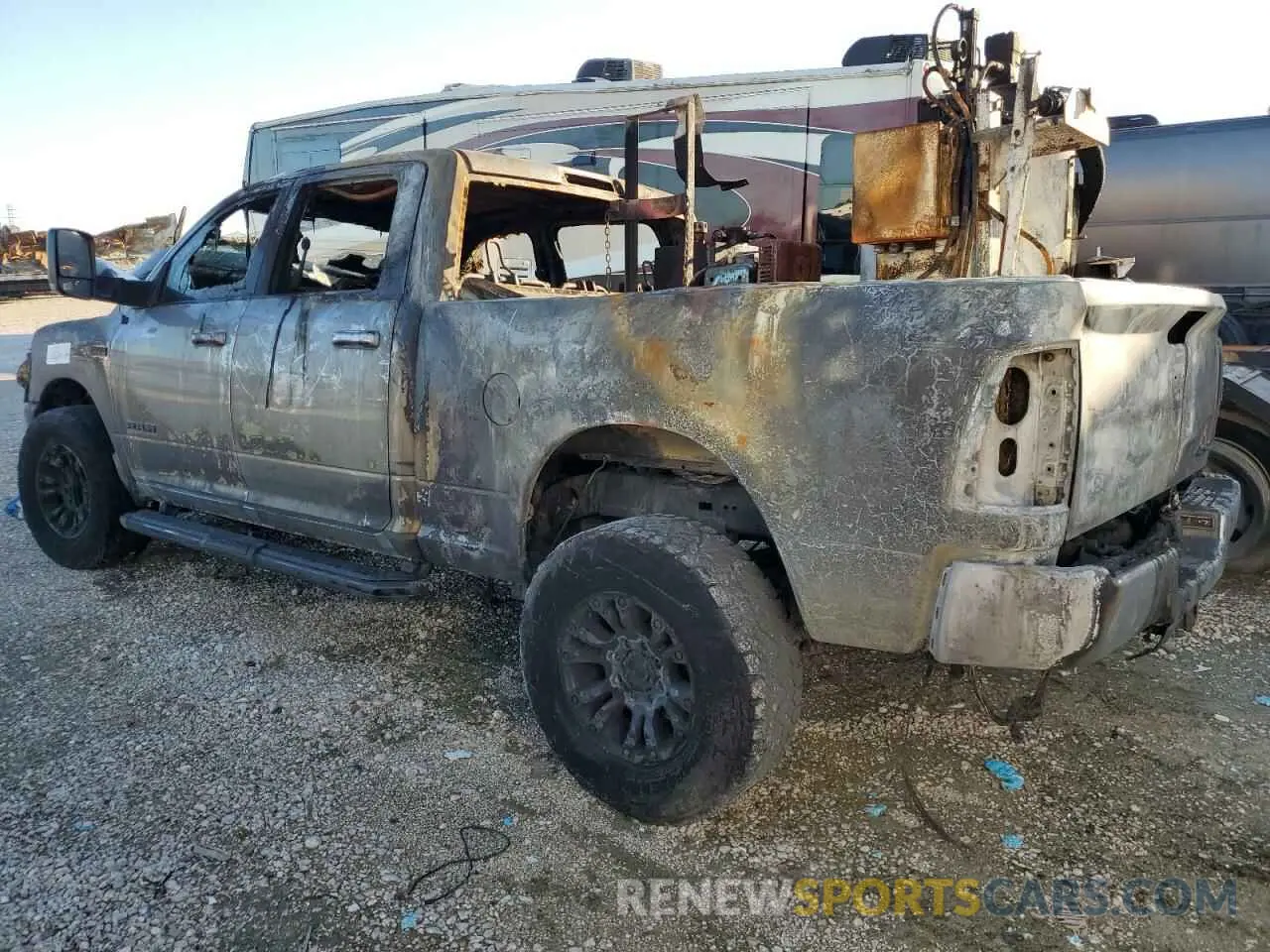 2 Photograph of a damaged car 3C6UR5DJ0NG397629 RAM 2500 2022