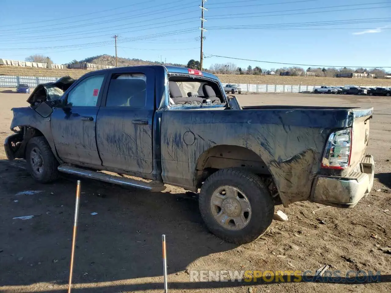 2 Photograph of a damaged car 3C6UR5DJ0NG403252 RAM 2500 2022