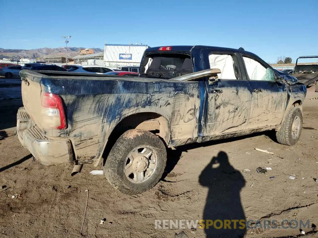 3 Photograph of a damaged car 3C6UR5DJ0NG403252 RAM 2500 2022