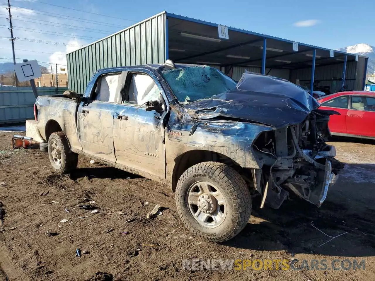 4 Photograph of a damaged car 3C6UR5DJ0NG403252 RAM 2500 2022