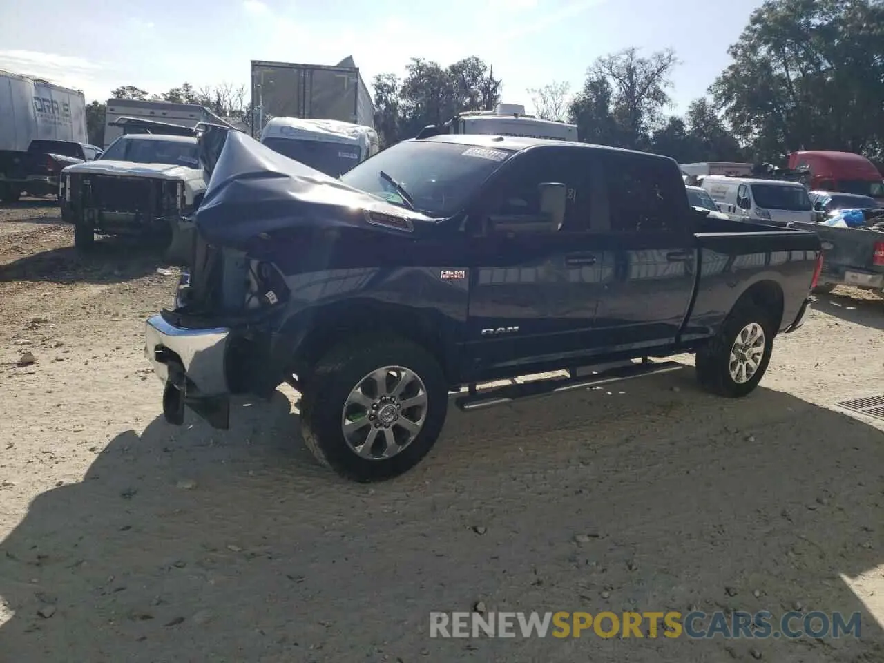 1 Photograph of a damaged car 3C6UR5DJ3NG170399 RAM 2500 2022