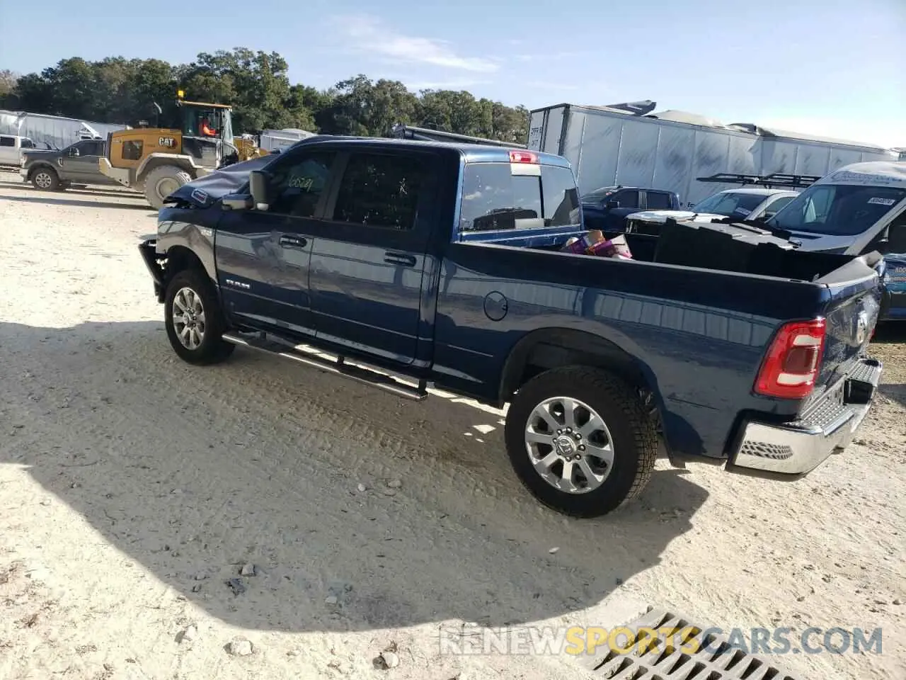 2 Photograph of a damaged car 3C6UR5DJ3NG170399 RAM 2500 2022