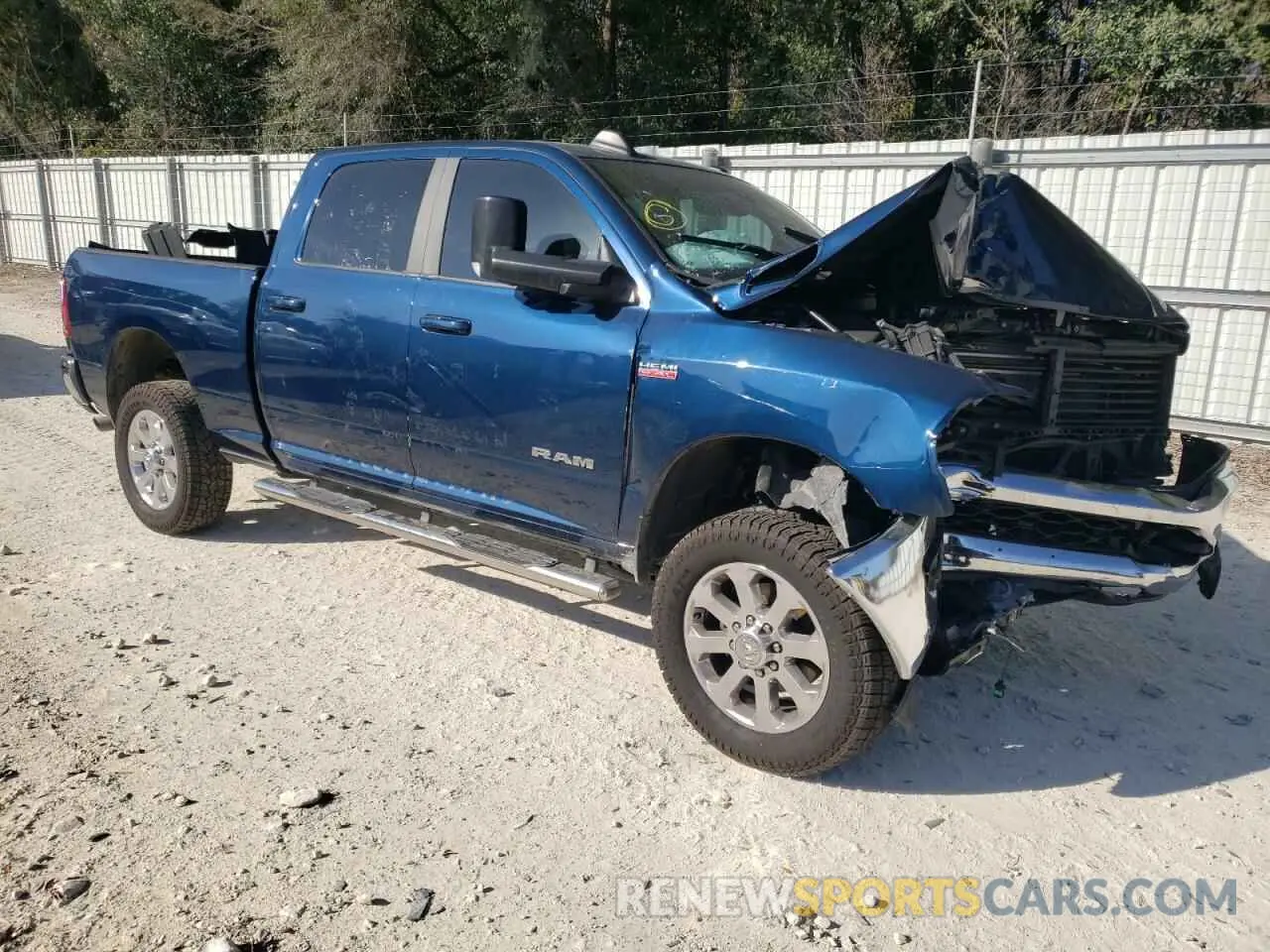 4 Photograph of a damaged car 3C6UR5DJ3NG170399 RAM 2500 2022