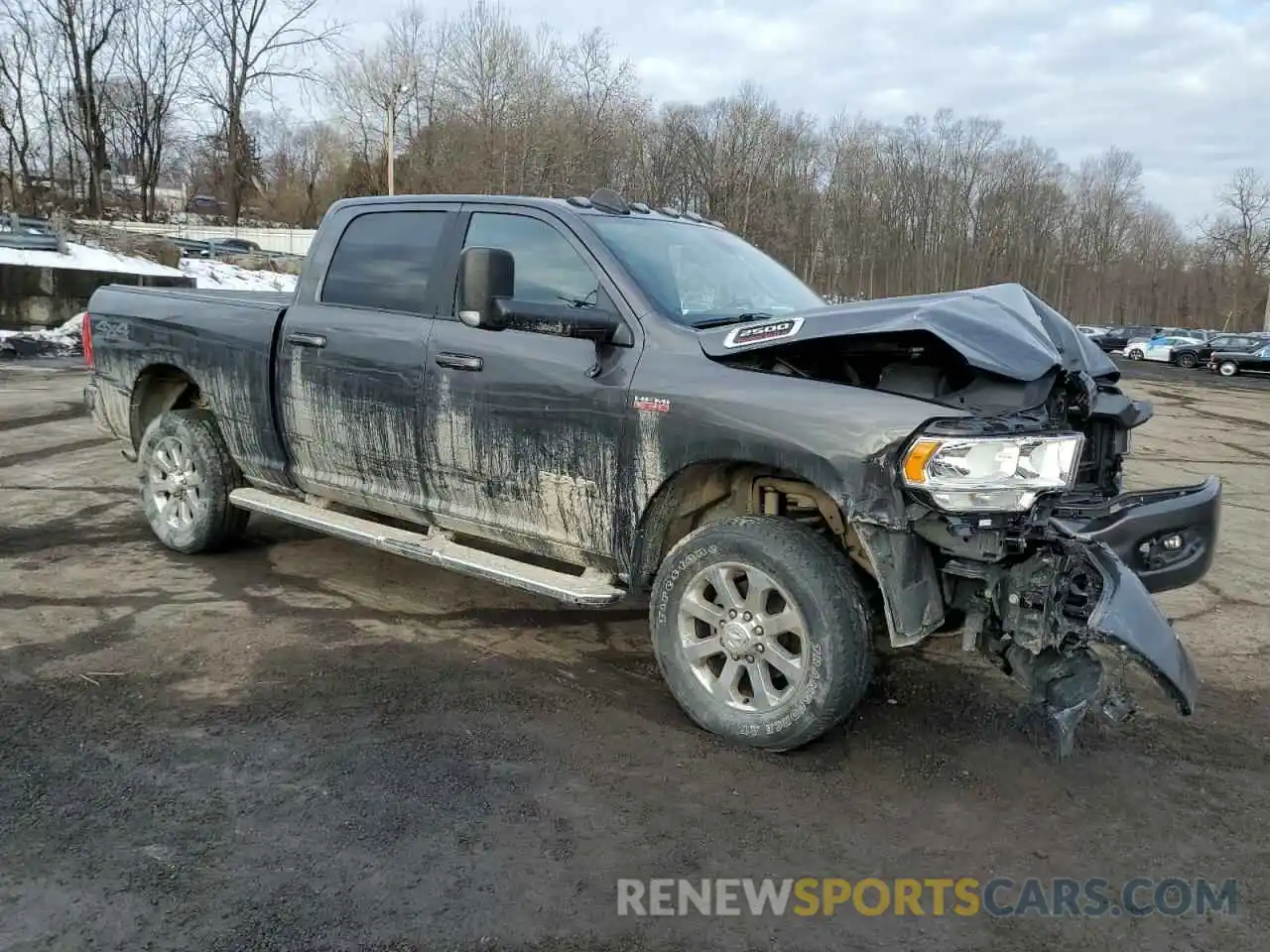 4 Photograph of a damaged car 3C6UR5DJ6NG380124 RAM 2500 2022