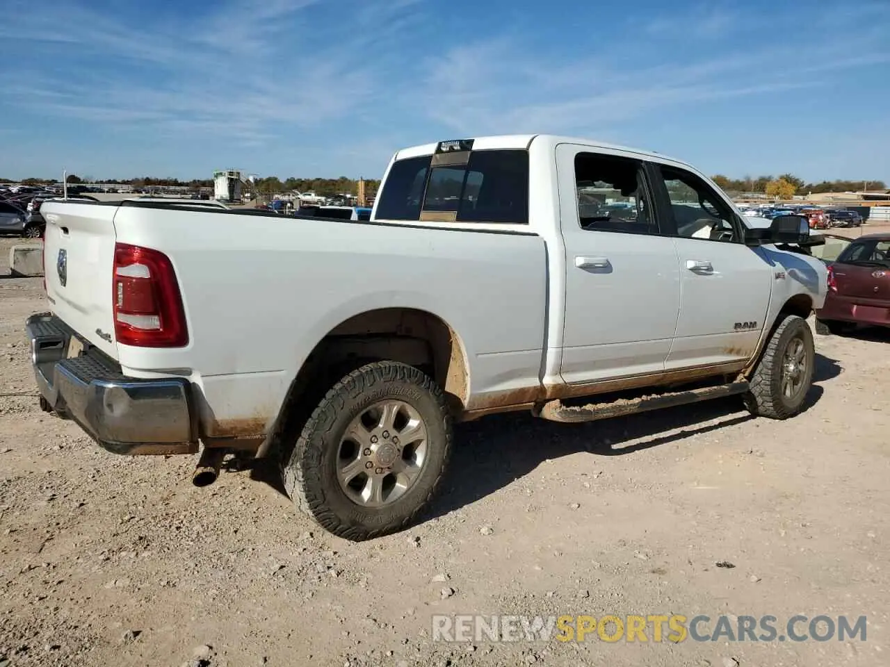 3 Photograph of a damaged car 3C6UR5DJ7NG273230 RAM 2500 2022