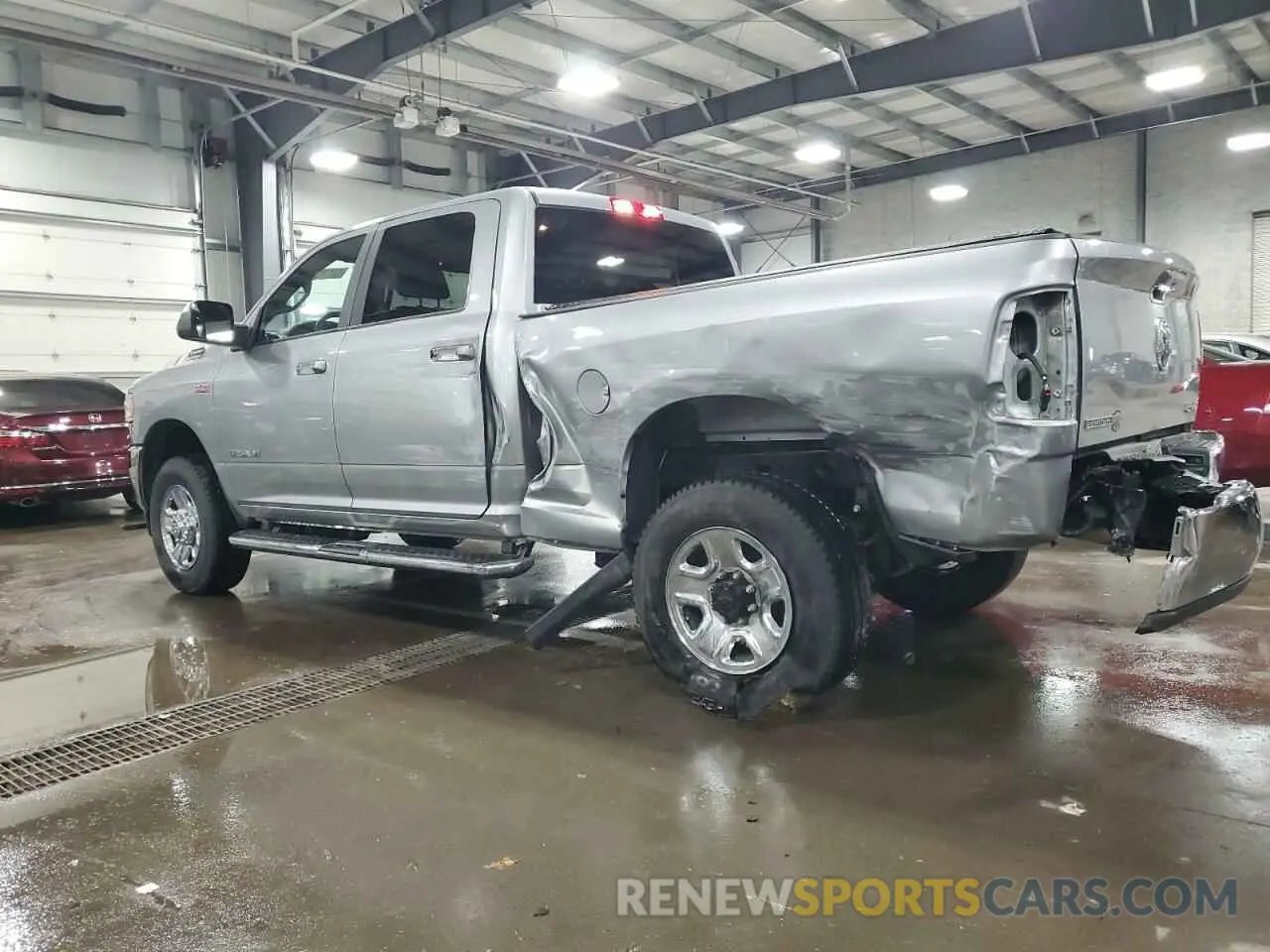 2 Photograph of a damaged car 3C6UR5DJXNG248029 RAM 2500 2022