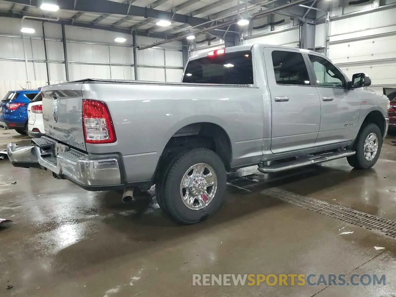 3 Photograph of a damaged car 3C6UR5DJXNG248029 RAM 2500 2022