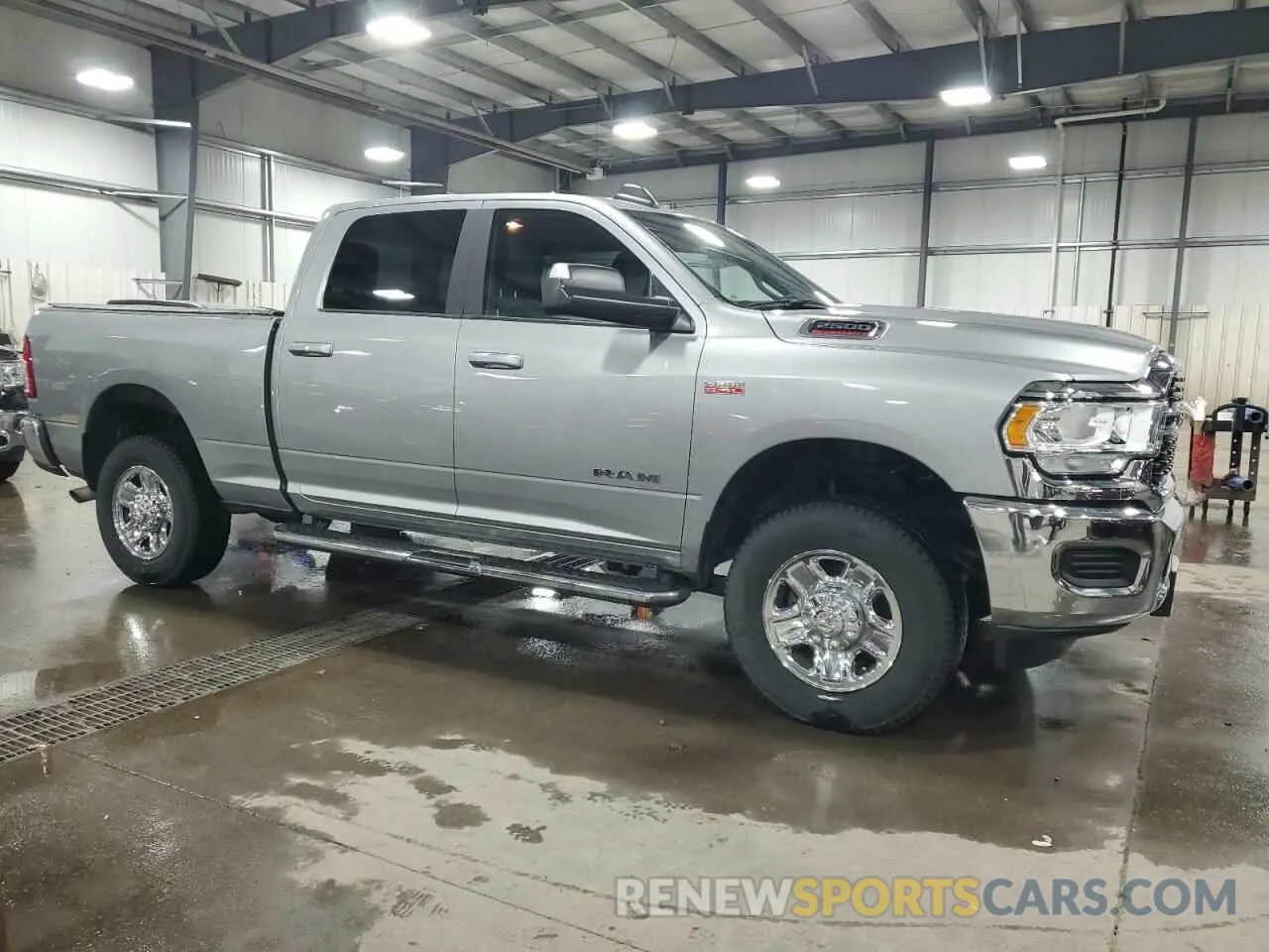 4 Photograph of a damaged car 3C6UR5DJXNG248029 RAM 2500 2022