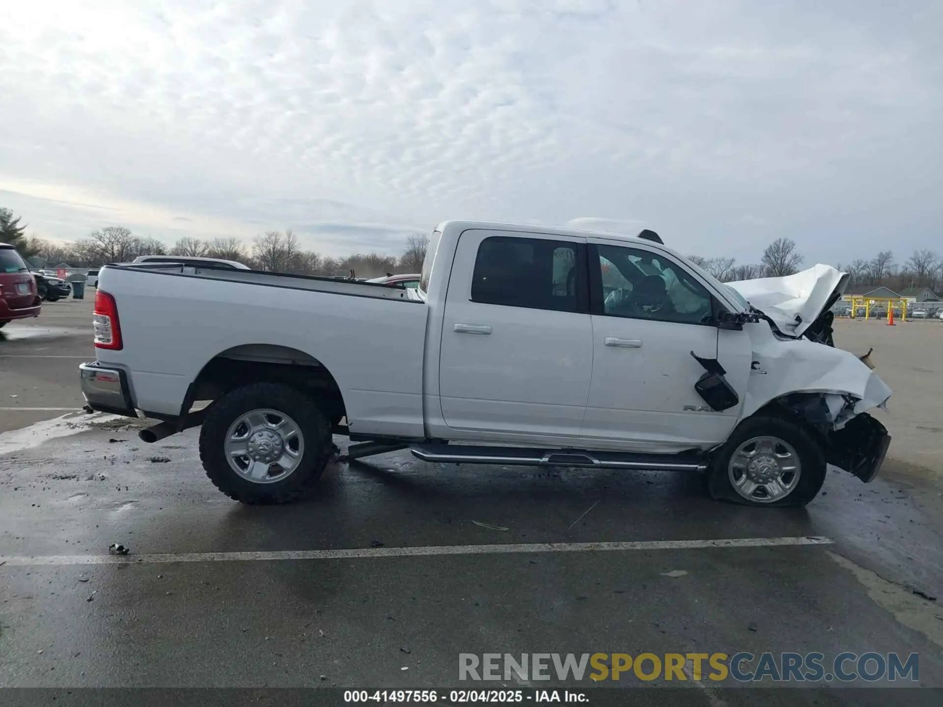 13 Photograph of a damaged car 3C6UR5DL0NG103812 RAM 2500 2022