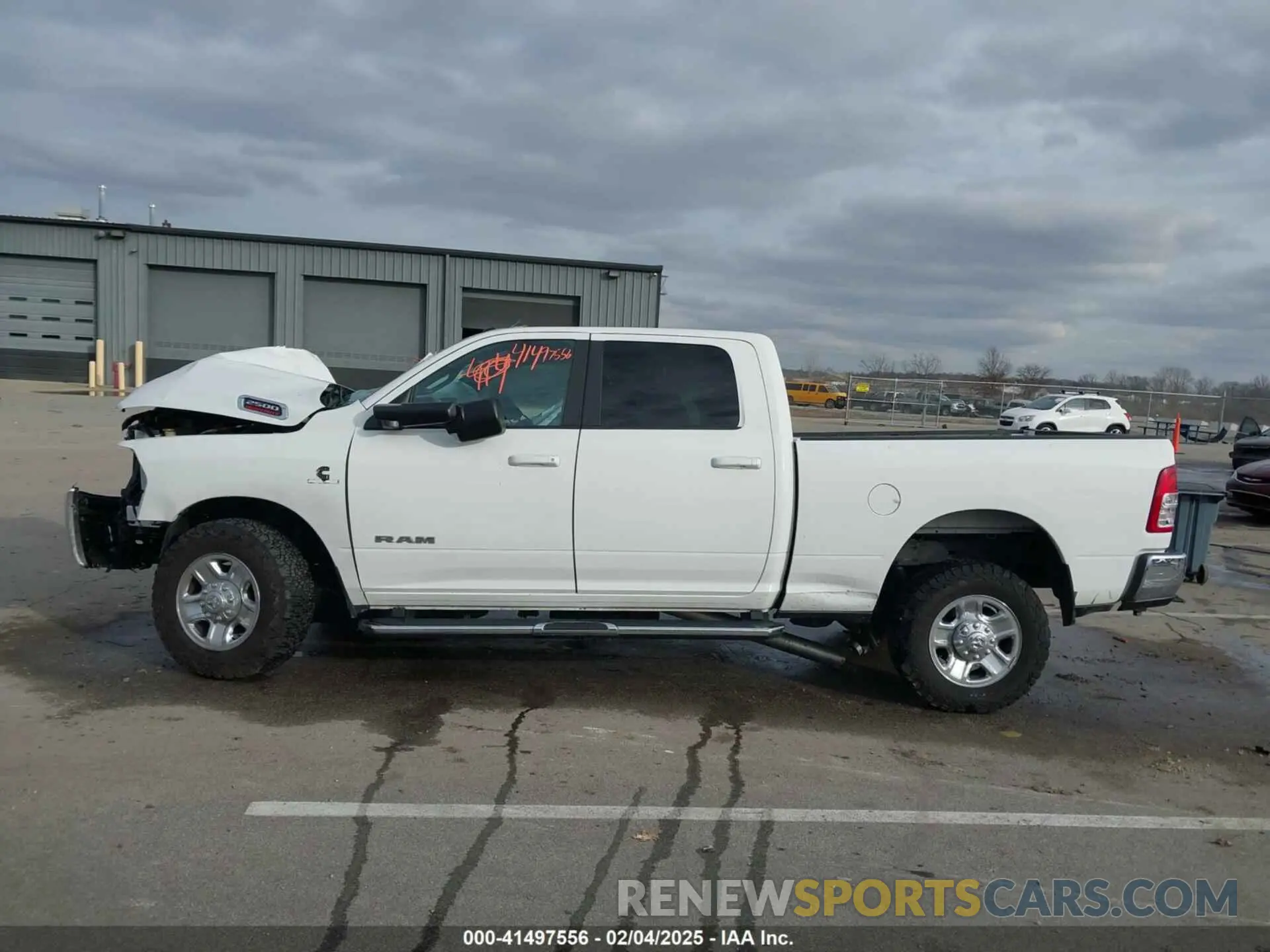 14 Photograph of a damaged car 3C6UR5DL0NG103812 RAM 2500 2022
